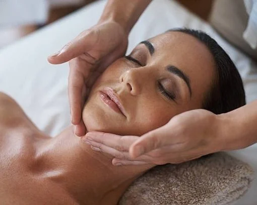 Woman receiving a customized facial treatment at Crystal Gayle Aesthetics