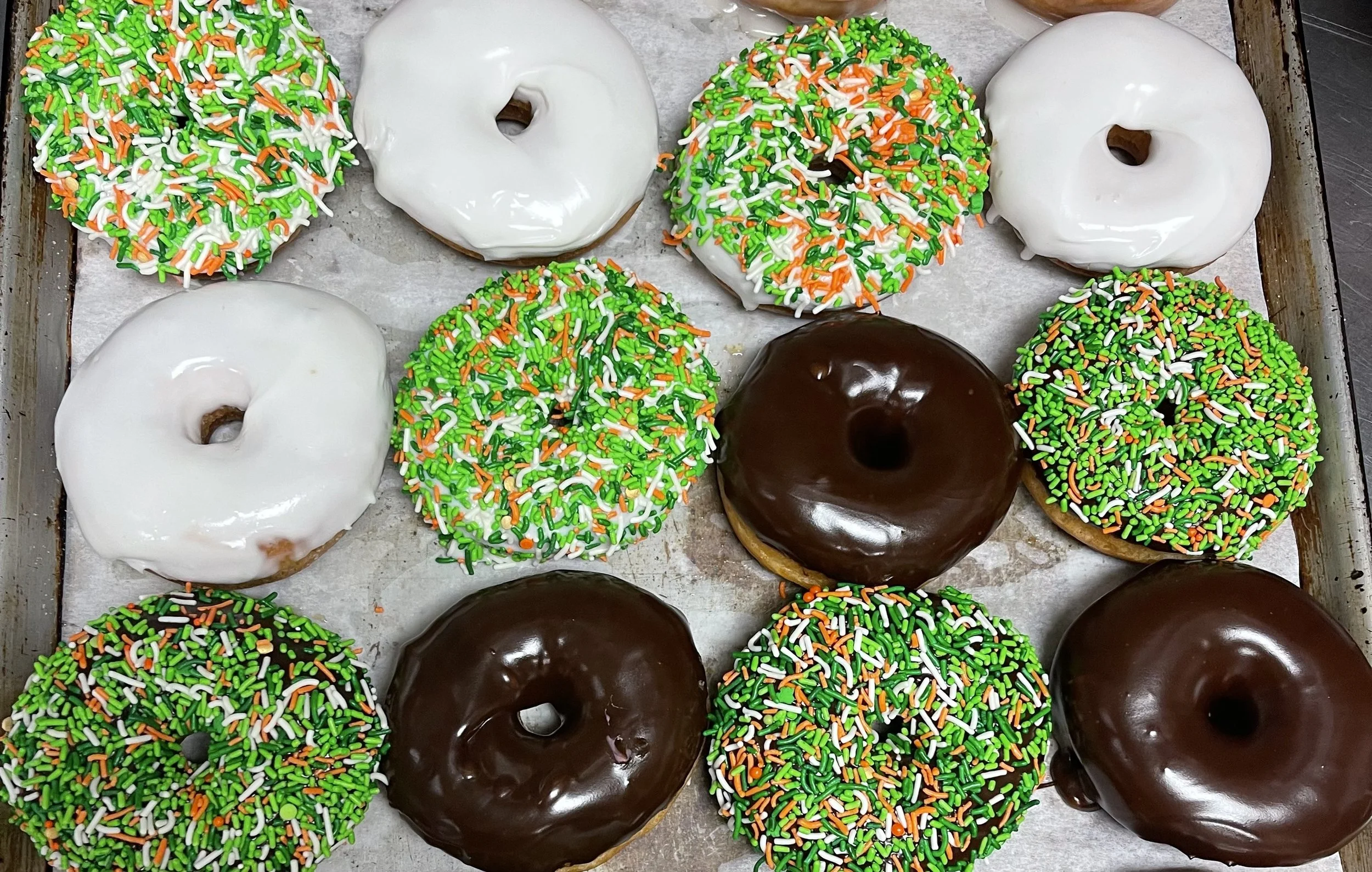 Dozen festive donuts
