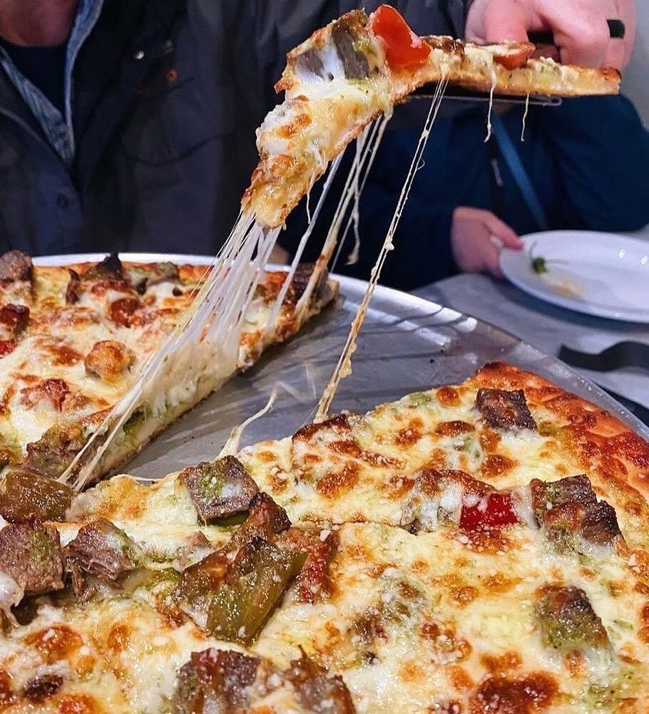 That cheese pull tho🤤🍕 Open all weekend long in the Strip District!! 

📸: Carne Asada Pizza, @cappydeats