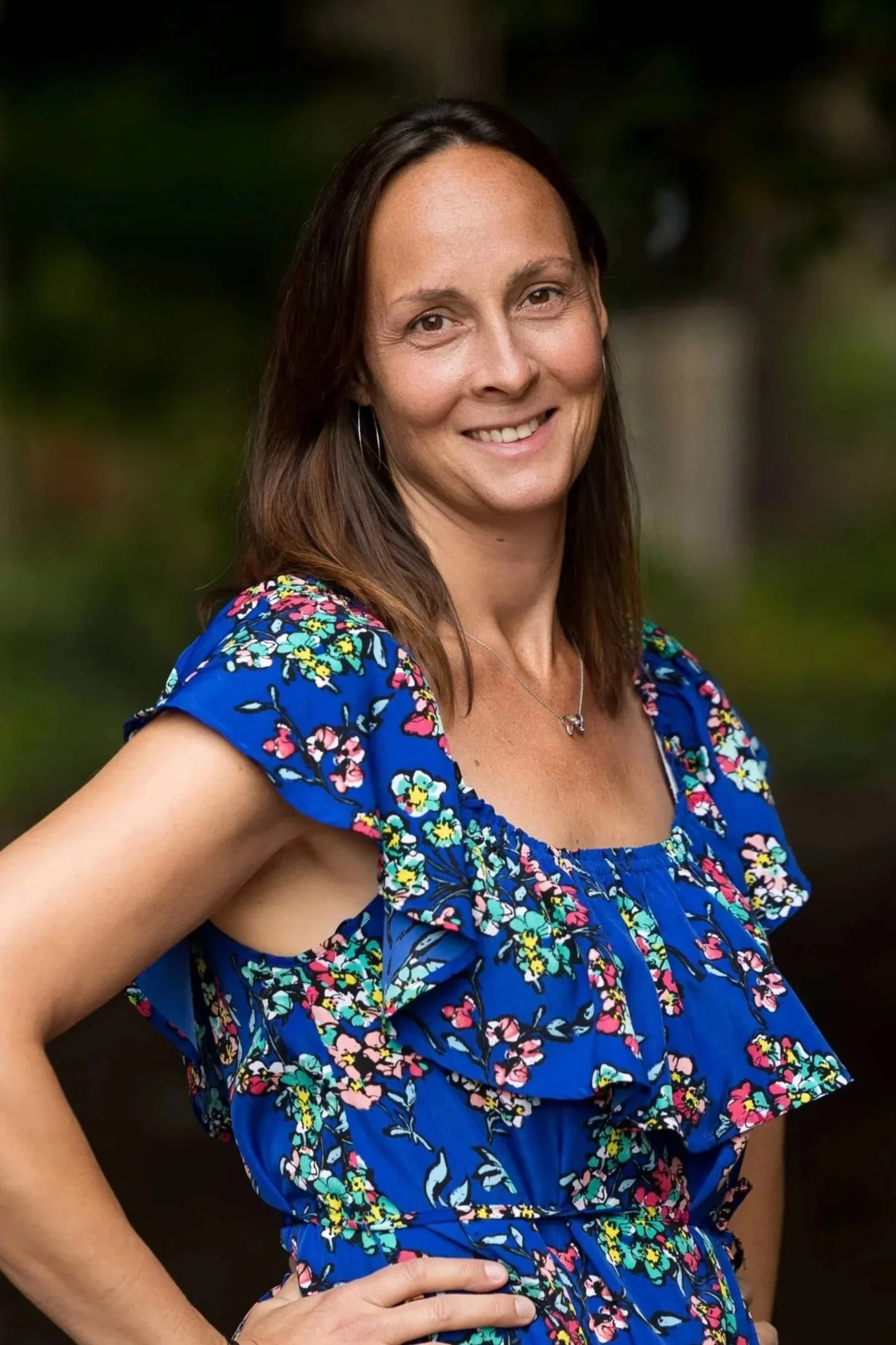 Silhouette of a person's head and shoulders with a placeholder text 'Photo Coming Soon'