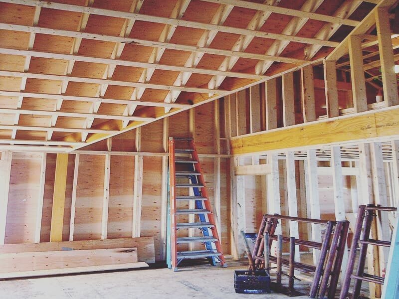 Because who doesn't love a good framing shot?? 😆 Okay fine, we know they're not the most exciting posts, but framing is one of the most important parts of any remodel or new construction. Here is the second floor of a new home where 2 gable ends mee