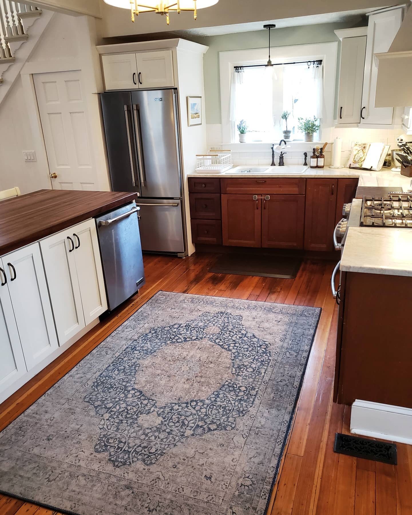 Kitchen Remodel! 🔨 We couldn't believe our eyes when we pulled up the ugly tile (check out the before pic) and found original wood flooring underneath. Even when they're imperfect, old floors have such character and charm, so we say expose 'em. We a