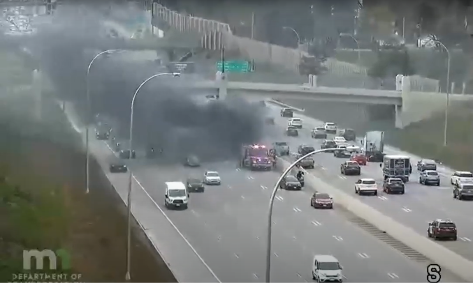 Nissan SUV Collides with Toyota Camry, Causing Fire and Traffic Delays