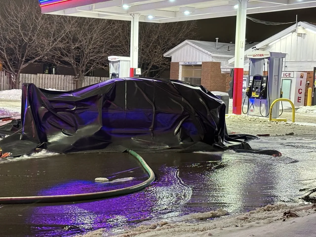 Firefighters Use Specialized Equipment to Extinguish Electric Vehicle Fire at Gas Station in Brooklyn Center