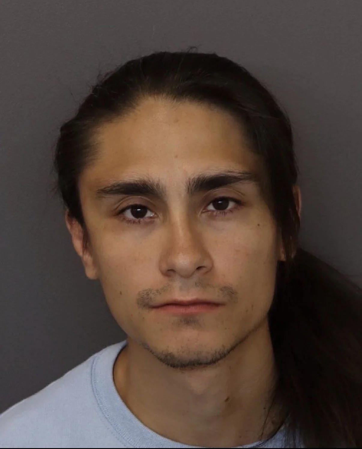 Hastings man charged after alleged fentanyl possession, firearms discovery during overdose investigation