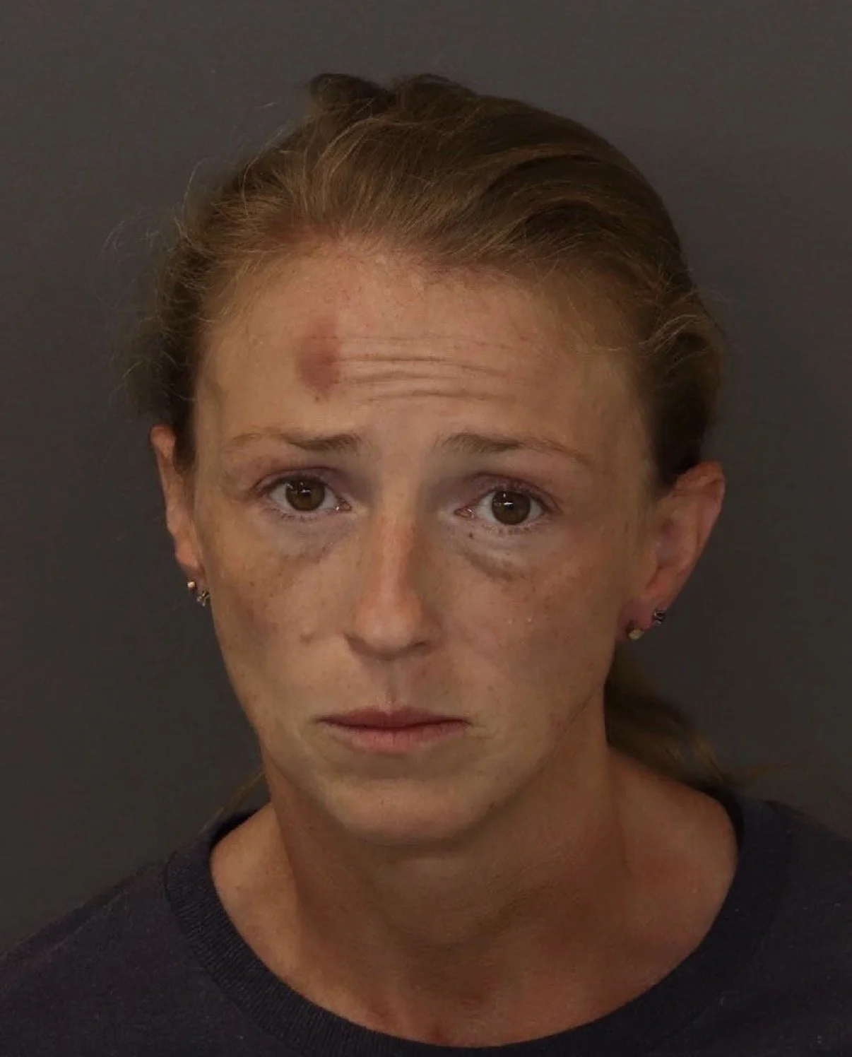 South St. Paul Woman Charged After Allegedly Spitting on Officers During Arrest
