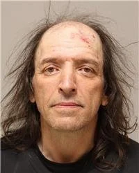 Blaine Man Charged After Allegedly Dragging Officer With Corvette, Crashing Into Yard