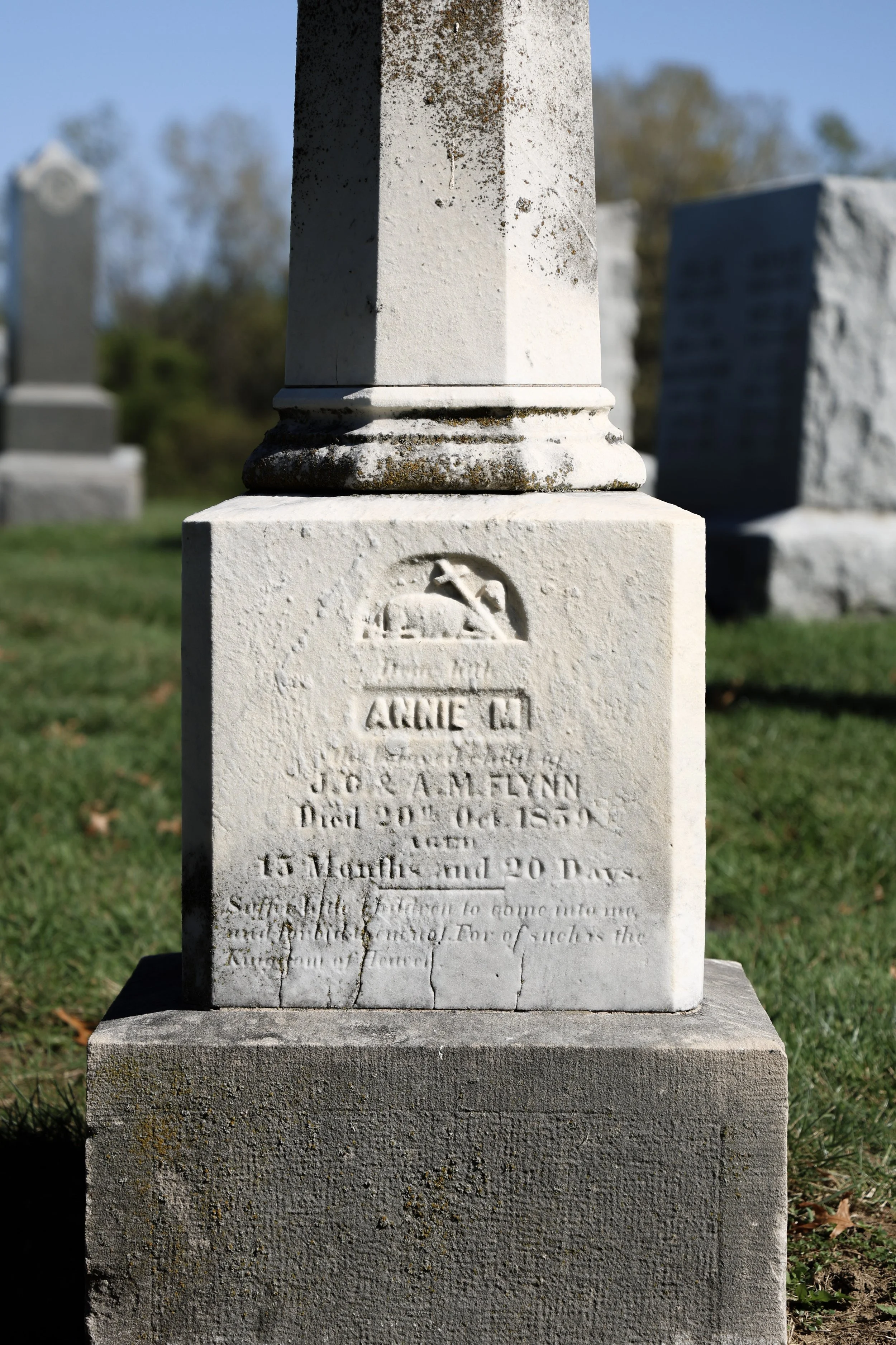 The grave of 1-year-old Annie M. Flynn. The inscription reads, "Suffer little children to come unto me, and forbid them not: for of such is the
kingdom of heaven."