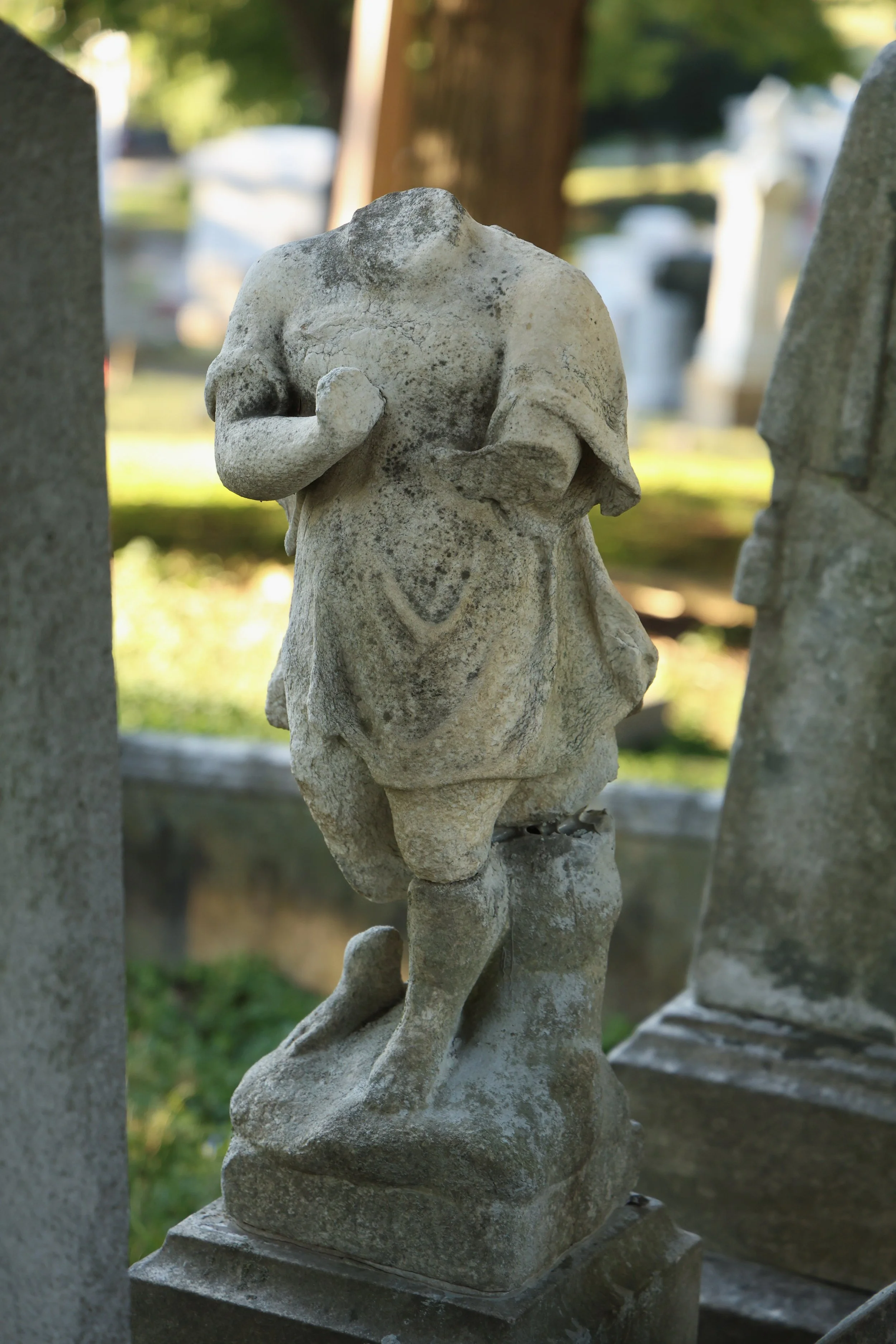 The headstone of Edna Schuster. Her father, Adam N. Schuster, was a wealthy German merchant and banker. Edna was his youngest daughter and child, and she died in 1883. She was the first to be buried on the family plot and remained there all alone for