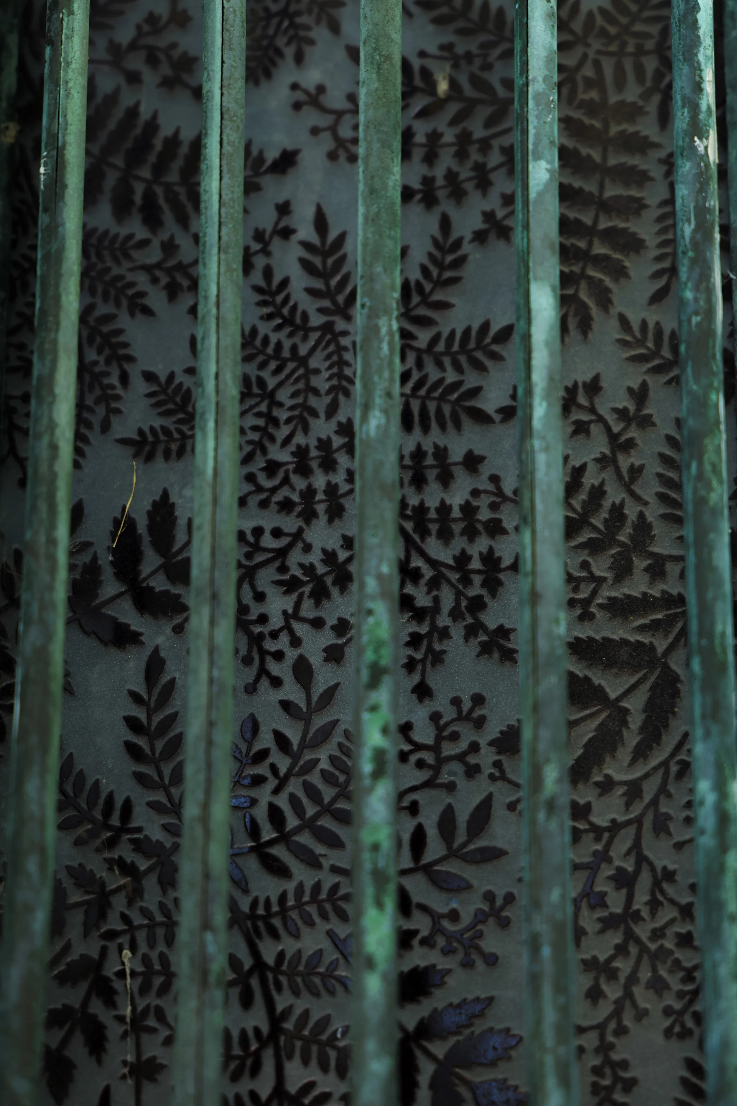 Carved red stained glass on the Judson Mausoleum.