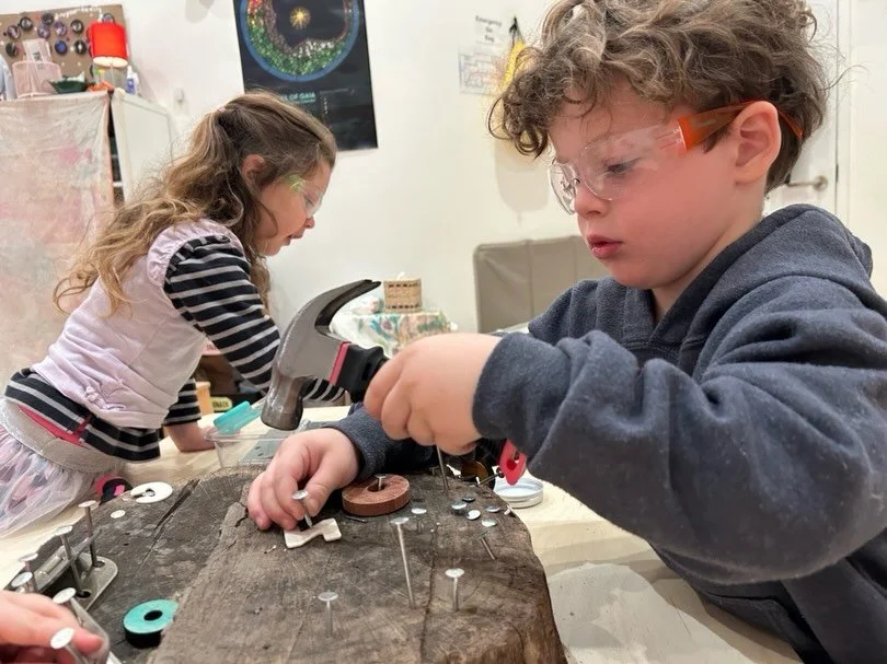 Pipe Building + Wood Working with the Puffballs (4-5 year olds)

With some tools, teamwork, and a little elbow grease, the Puffballs can build it all. Recently, they used PVC pipes and connectors to construct telescopes, cotton candy machines, fire s