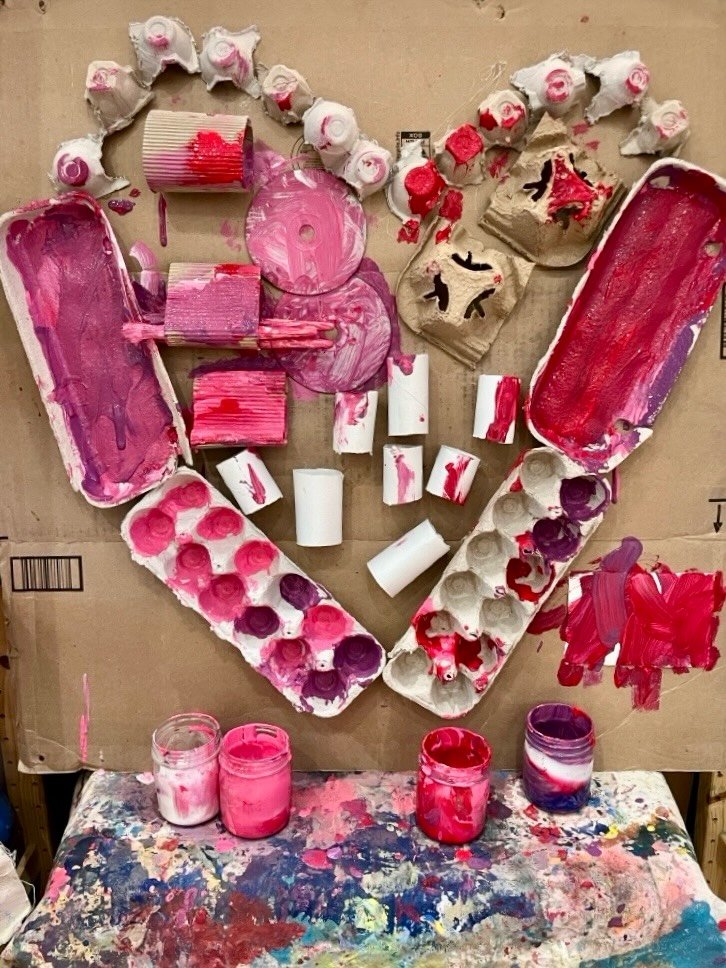 In the Chickadees&rsquo; class (2-year-olds), the children worked together to paint a large heart created from recycled materials. This collaborative art project represents acts of kindness, belonging, and caring for one another.

The children added 