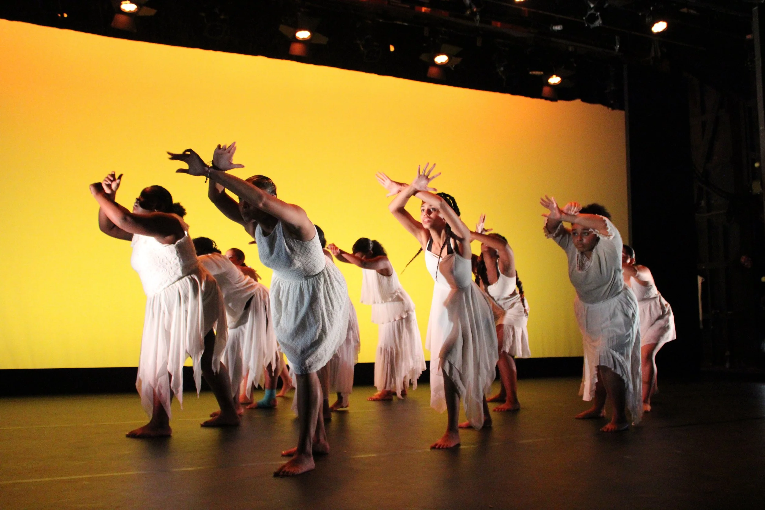 !Dance show yellow arms crossed.JPG