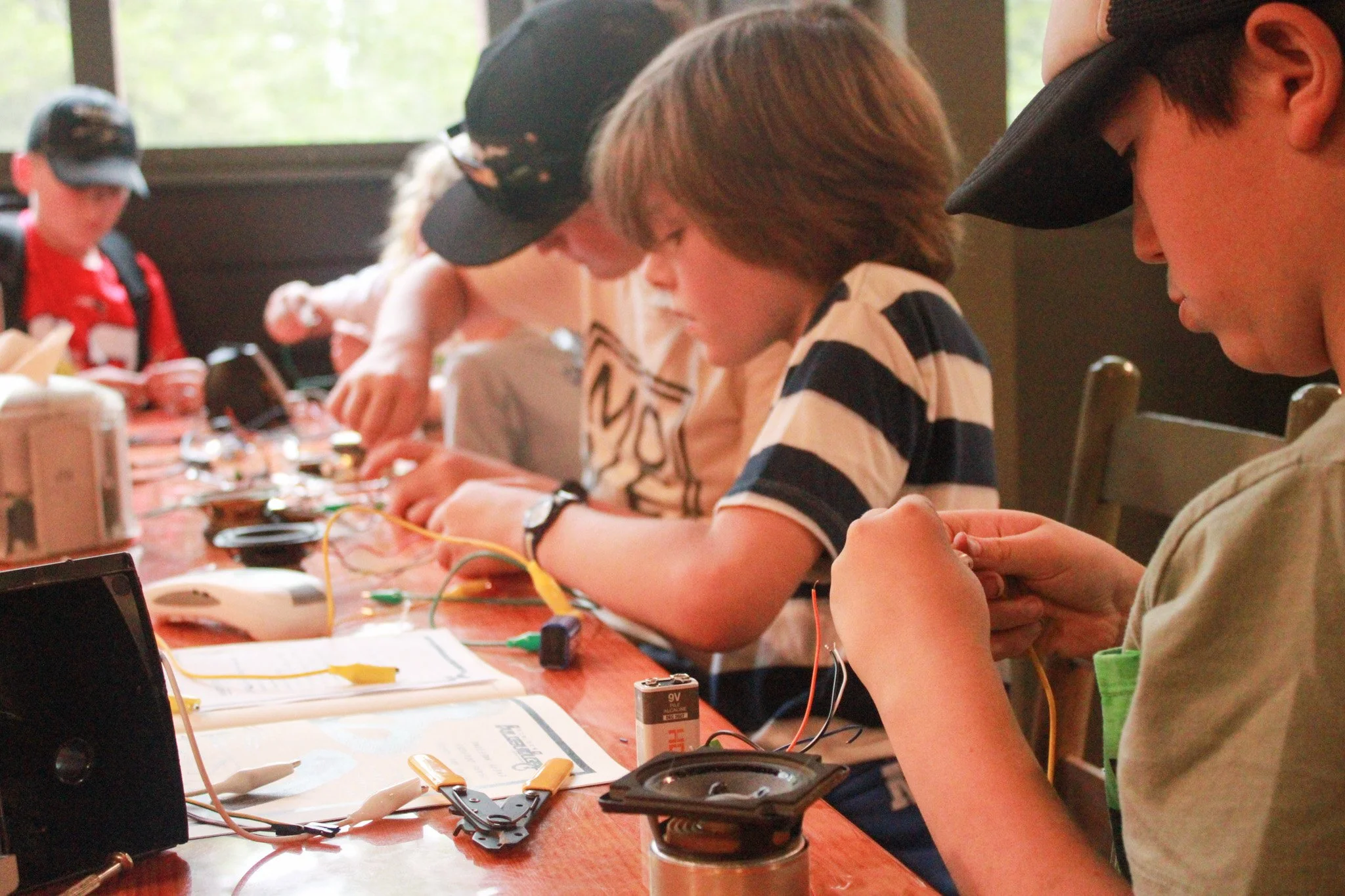 One kid’s trash is another kids microphone… Disengineering Society came today to teach campers how to turn old tech garbage in to microphones and synthesizers!