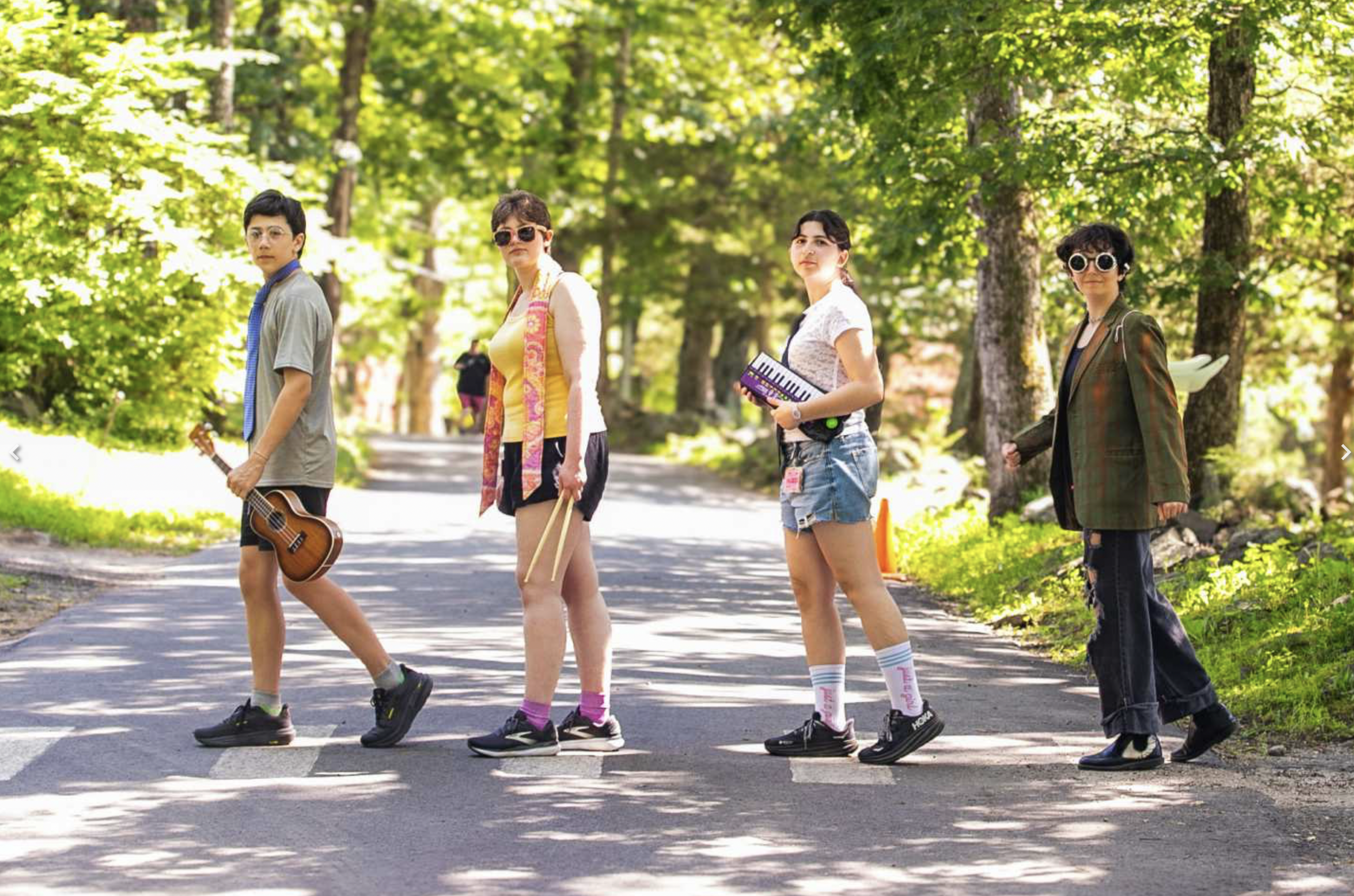 clown CITs welcome campers on their first day dressed as the Beatles/Beetles...