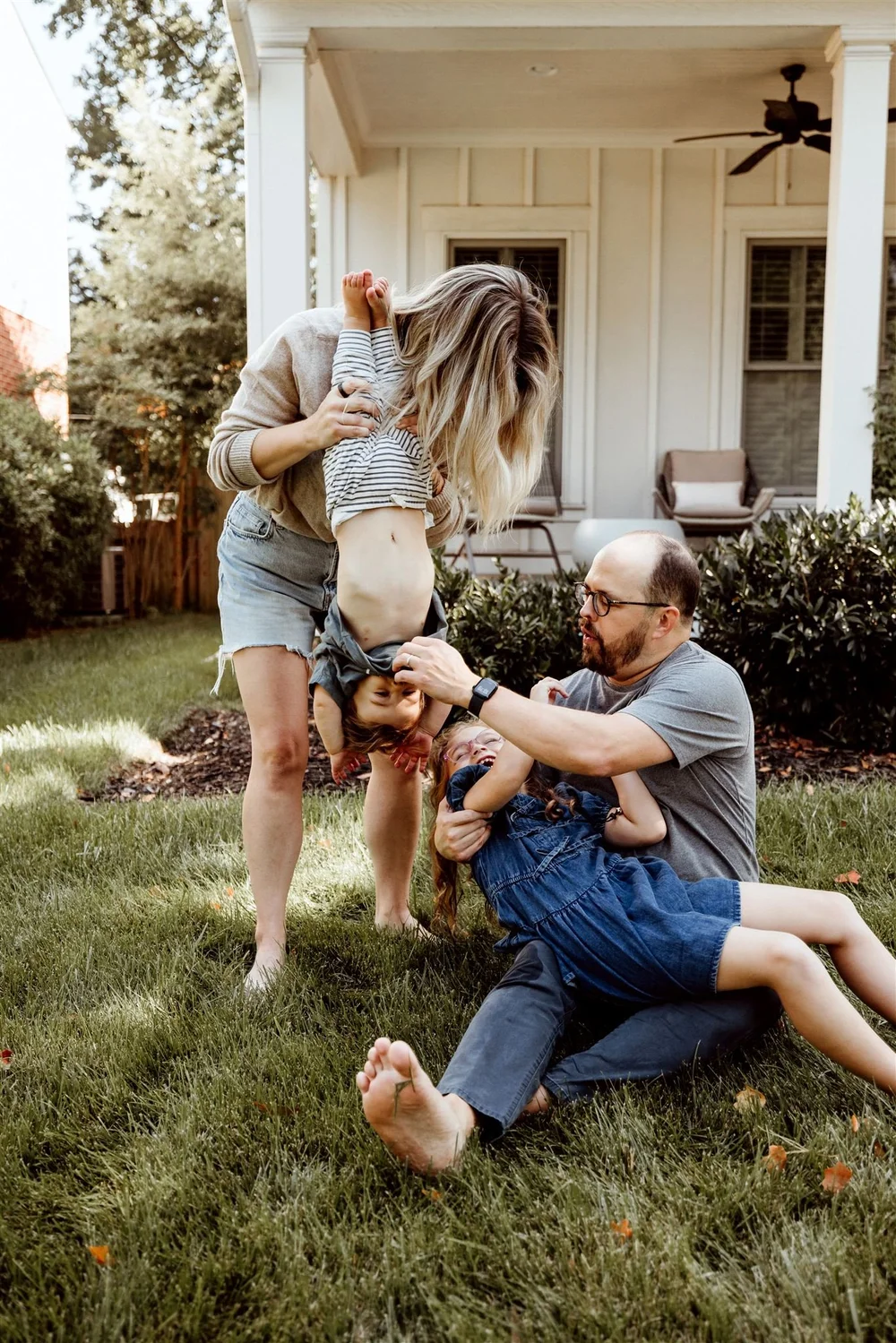 An intimate motherhood portrait outdoors in natural light