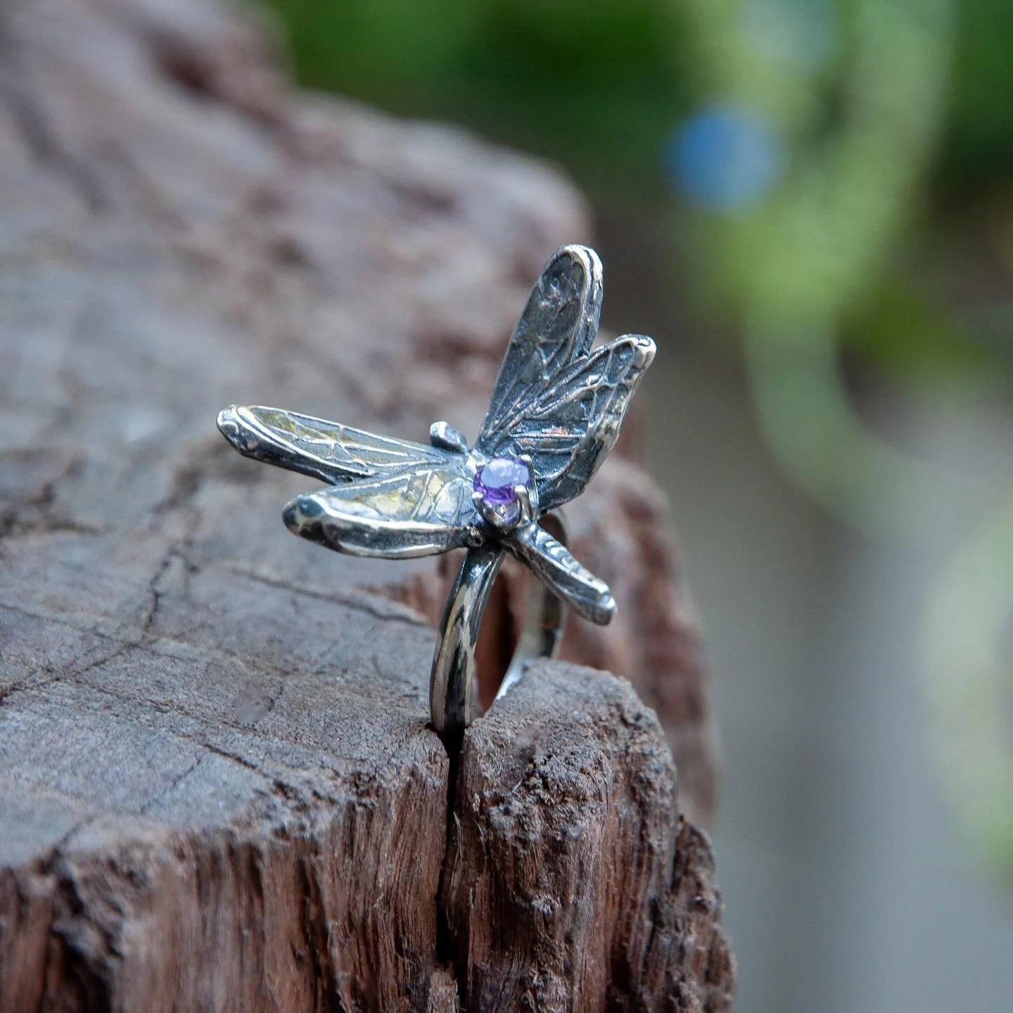 Sterling silver dragonfly ring with AAA amethyst. These insects can fly in any direction- up, down, forward, back, left and right, and they can change direction quickly. They can even stealth fly by appearing stationary when they&rsquo;re attacking. 