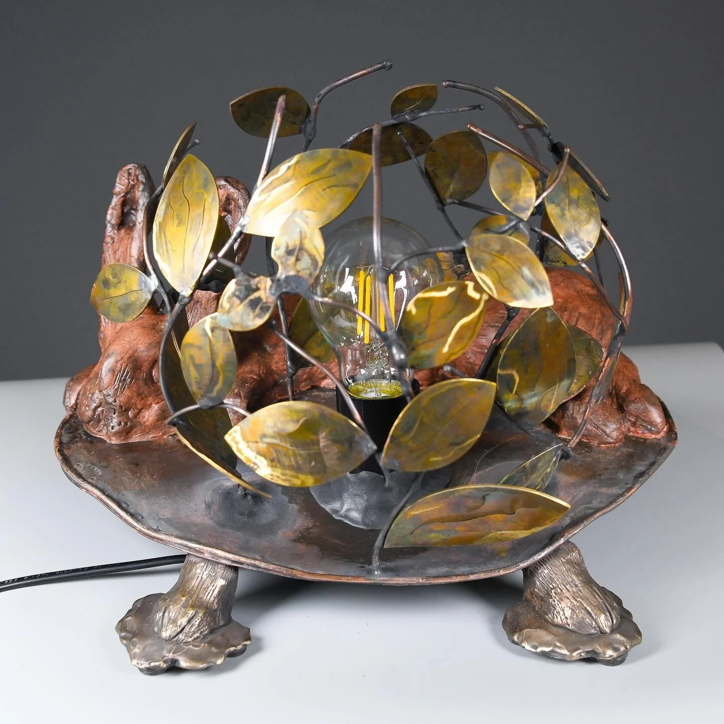 The first lamp I&rsquo;ve made for a while&hellip;bronze rabbit paw feet with brass and copper fabricated base and branches, and a sculpted clay rabbit.