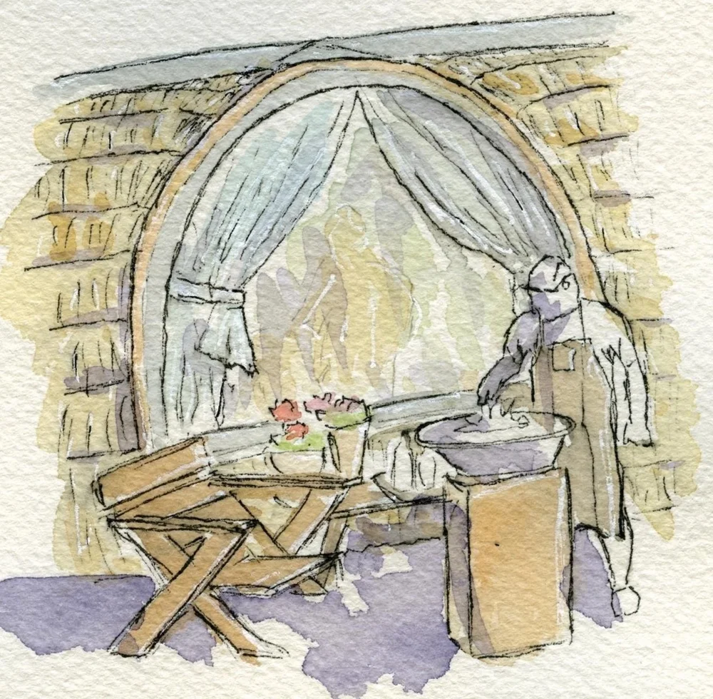 Illustration of a lodge terrace with outdoor cooking