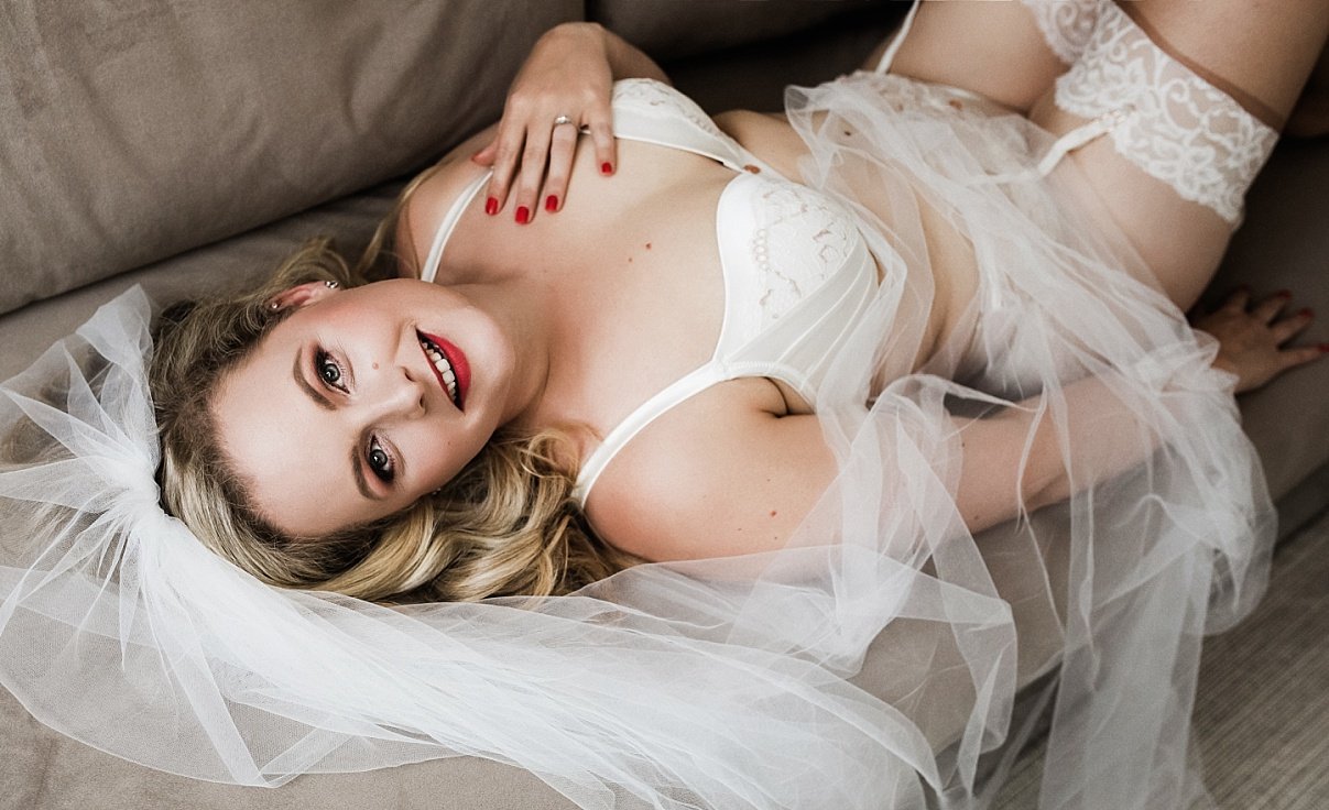 Essex Bridal boudoir, woman in white bridal lingerie