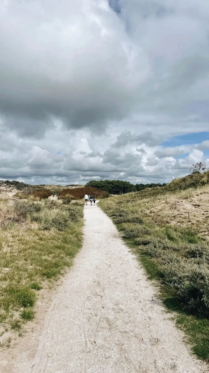 family walking through a natural space on holiday