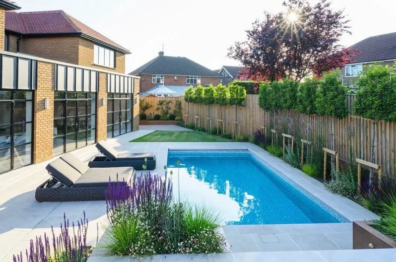 Before ➡️ After
Garden transformation 🌿
&nbsp;
What started out as an overlooked building site is now a sleek, contemporary family garden &ndash; complete with swimming pool, naturalistic planting and a sun-soaked seating area, perfect for entertain