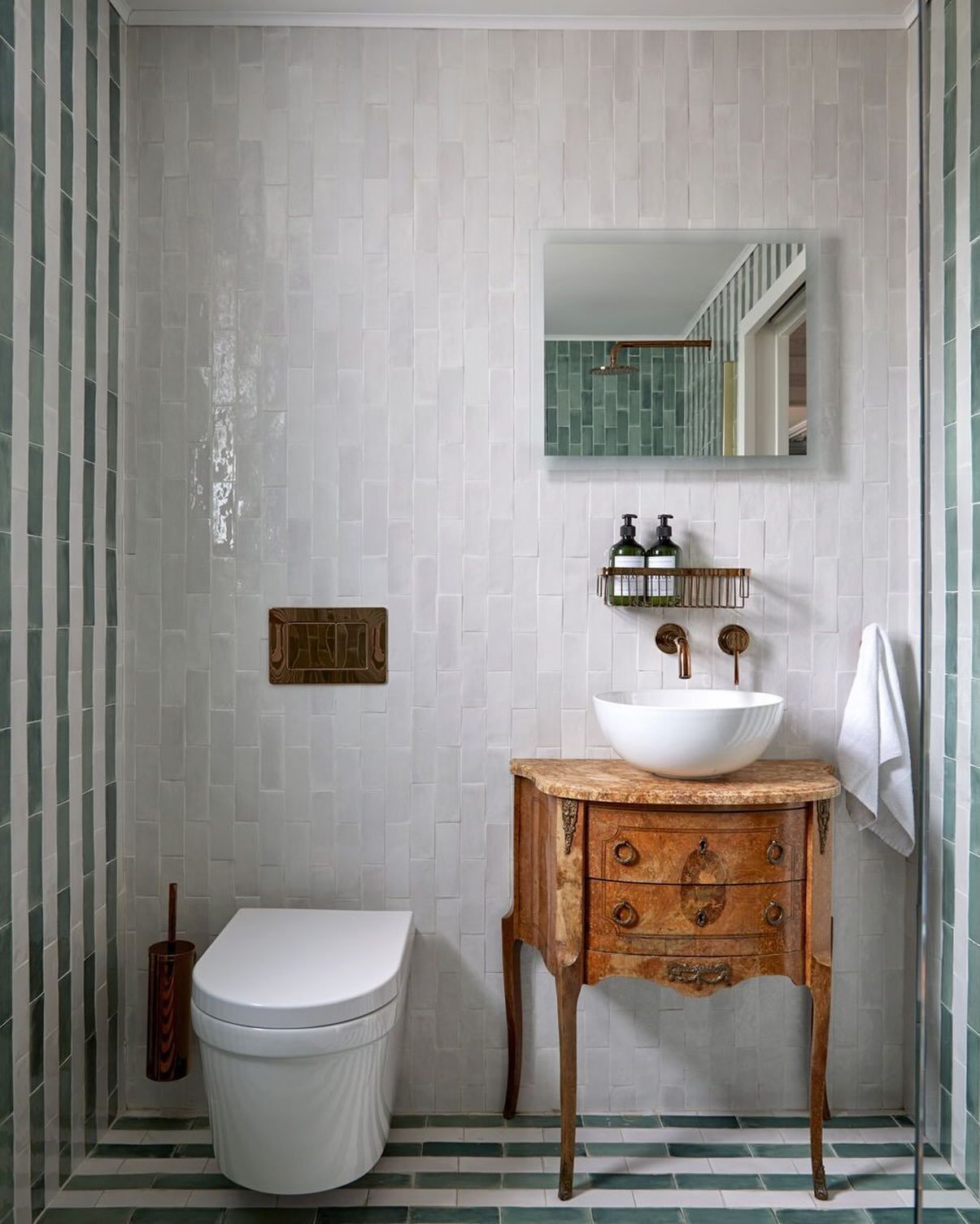 Not every bathroom needs to feel like a spa. This one was designed by our member @lumin.architects , to feel like it&rsquo;s always been there. 
🌟 
An antique chest repurposed as a vanity, zellige tiles that catch the light differently every hour, b