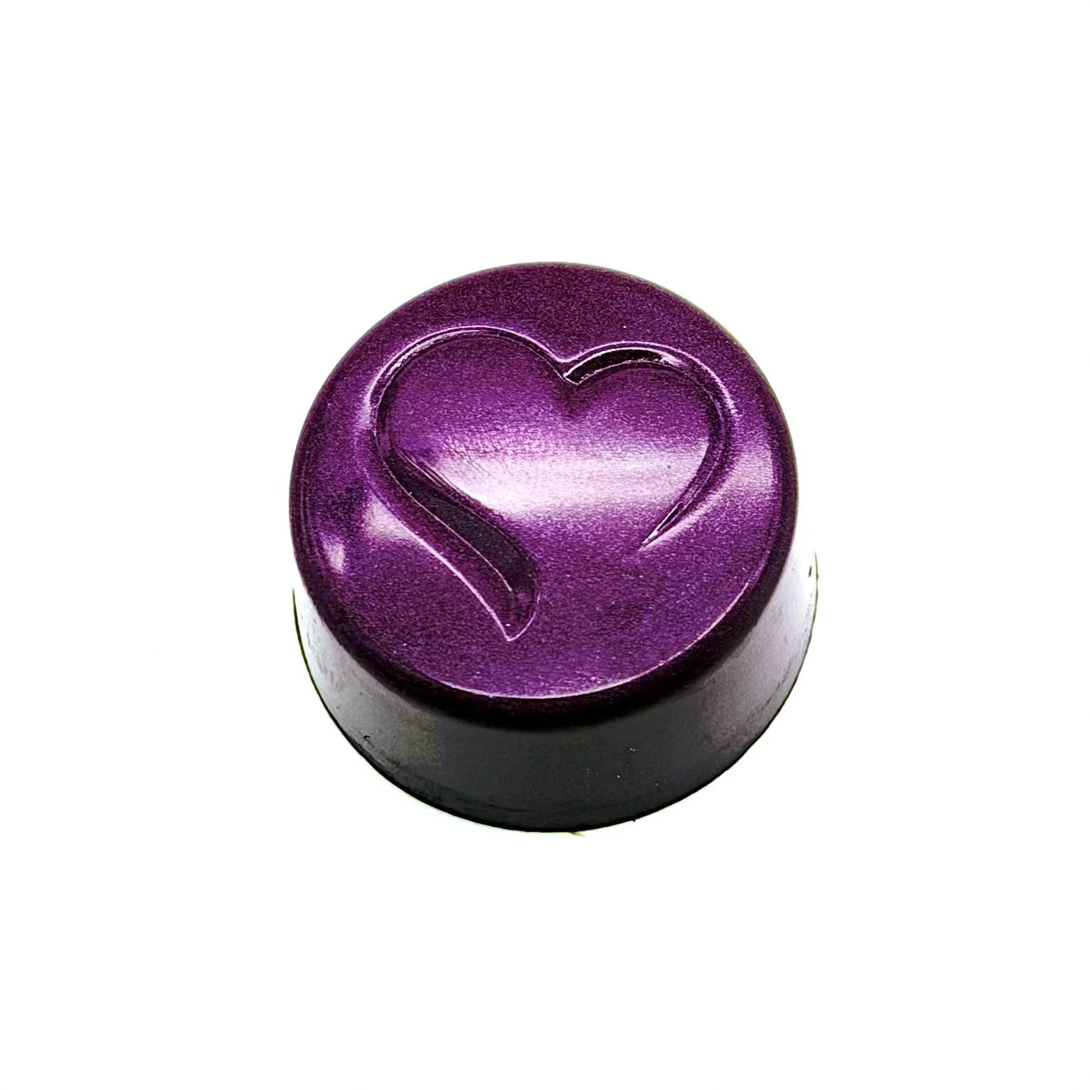 Purple round bonbon with heart decoration