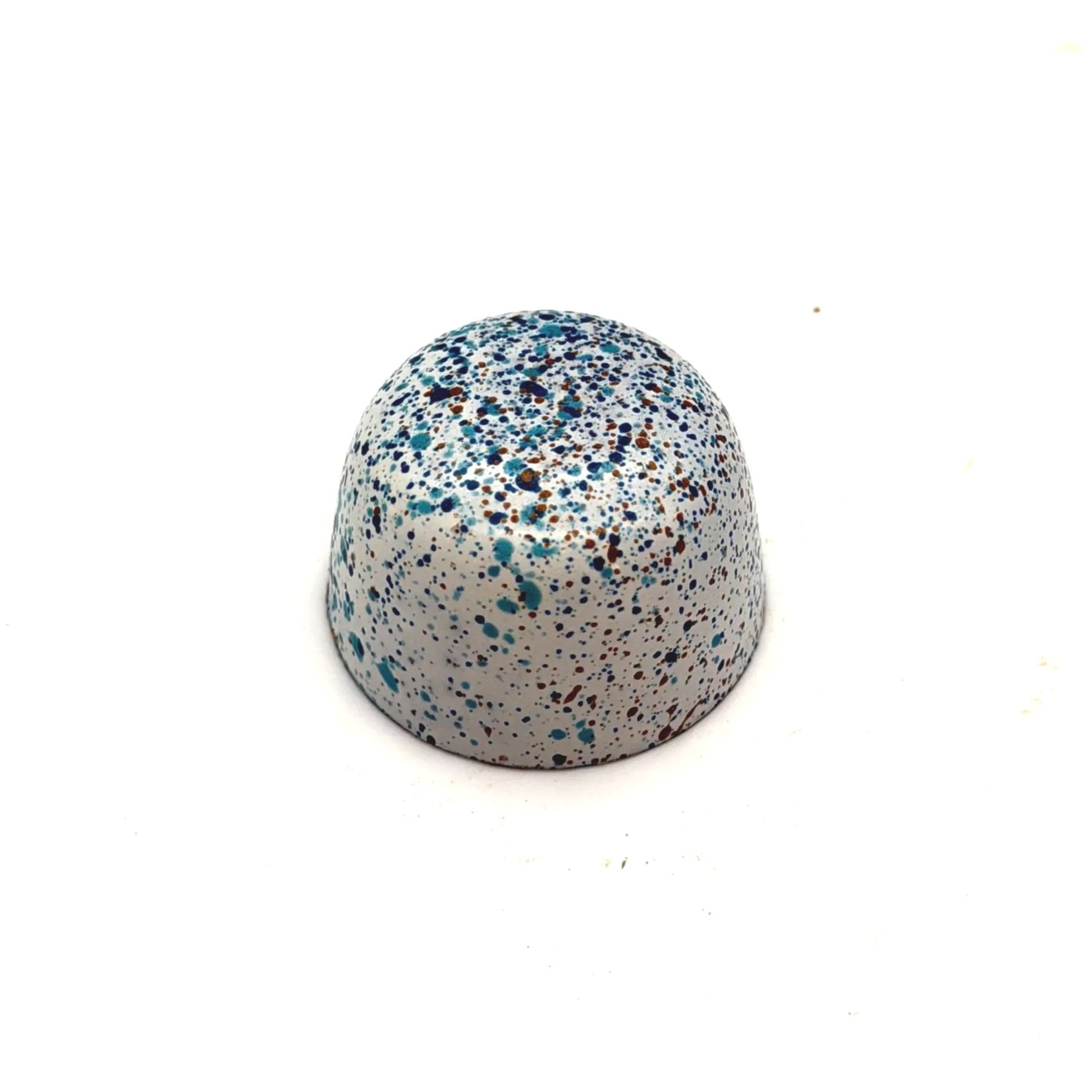 White with blue and brown speckles