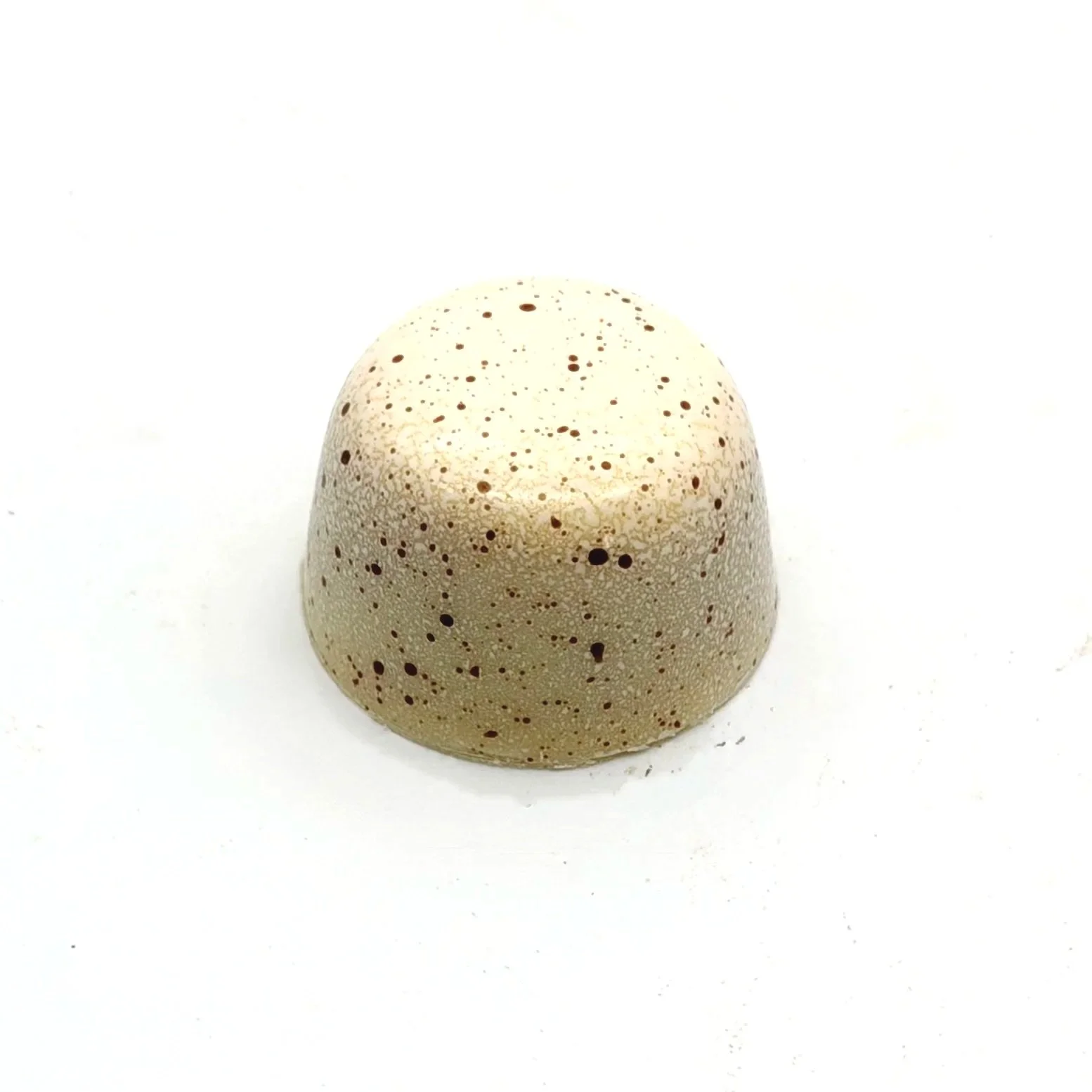 White with bronze speckles