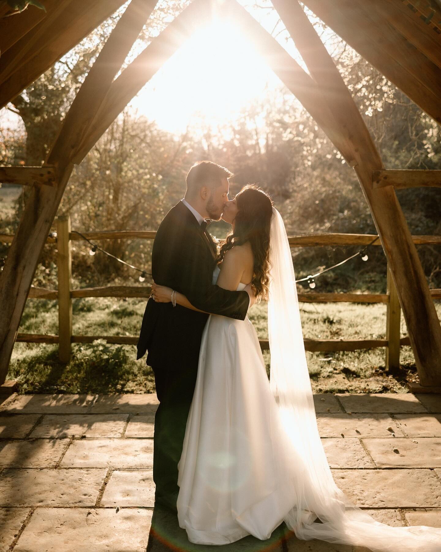 The lovely Sammie and Tom captured at their spring wedding at @millbridgecourt as the sun began to set 🧡✨

Hair &amp; make up @lolaandco.co.uk 
Event styling @ambiencevenuestylingsurrey 
Florals @afloral_affair 
Dress @purecouturebridal 
Cake @sammi
