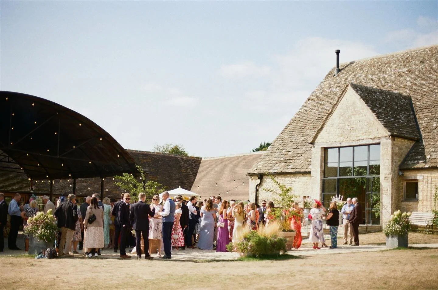 Currently finishing up on M&amp;Ds gorgeous summers day at the stunning @yardspaceoldgore in the Cotswolds. Here is one of my film captures of their drinks reception 🎞️ lots more to share soon ✨
 
#oldgore #cotswoldswedding #cotswoldsweddingphotogra