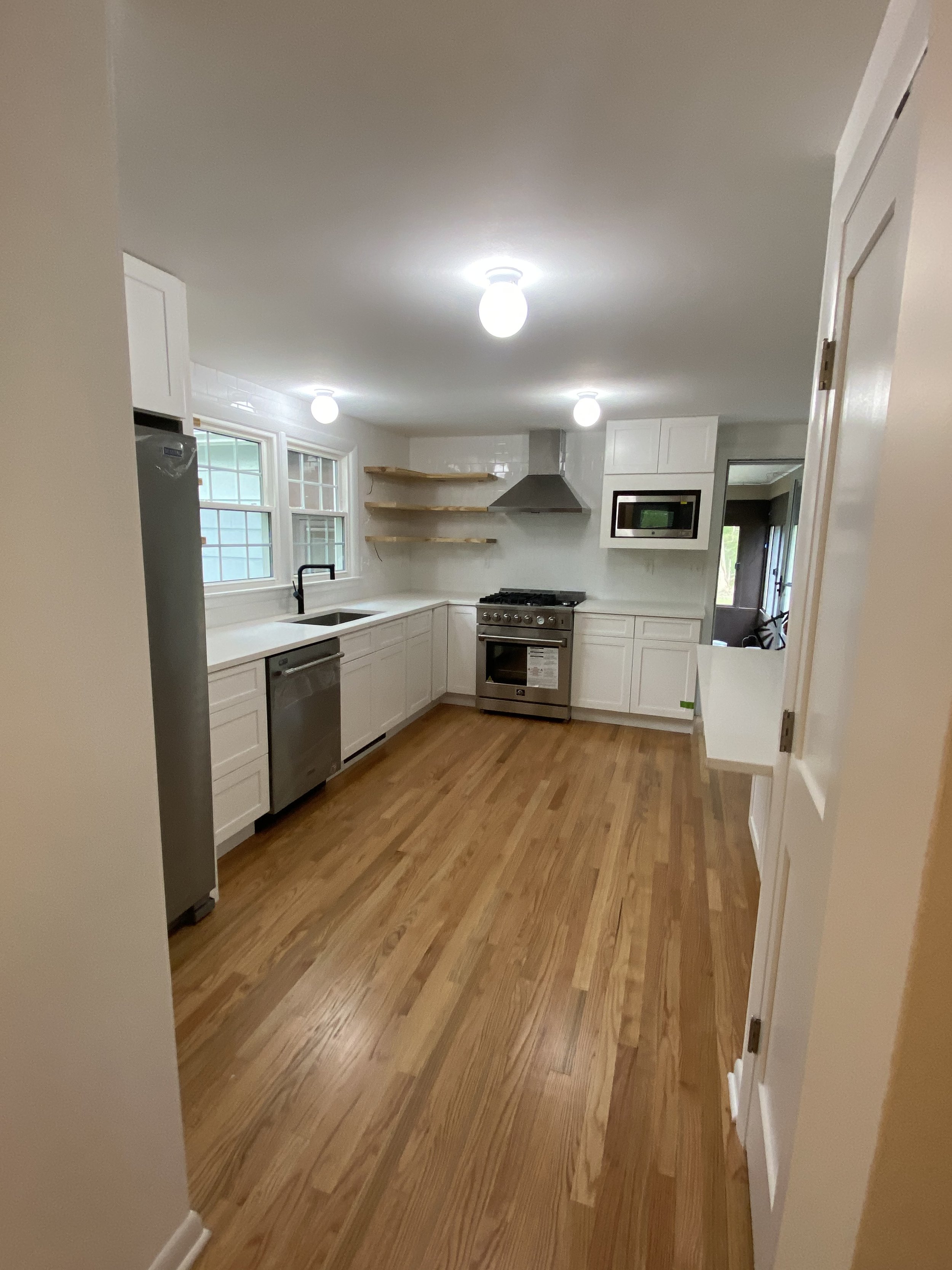 Classic Shaker Style With Modern Touches Kitchen Remodel by TC Praxis Building and Remodeling project photo