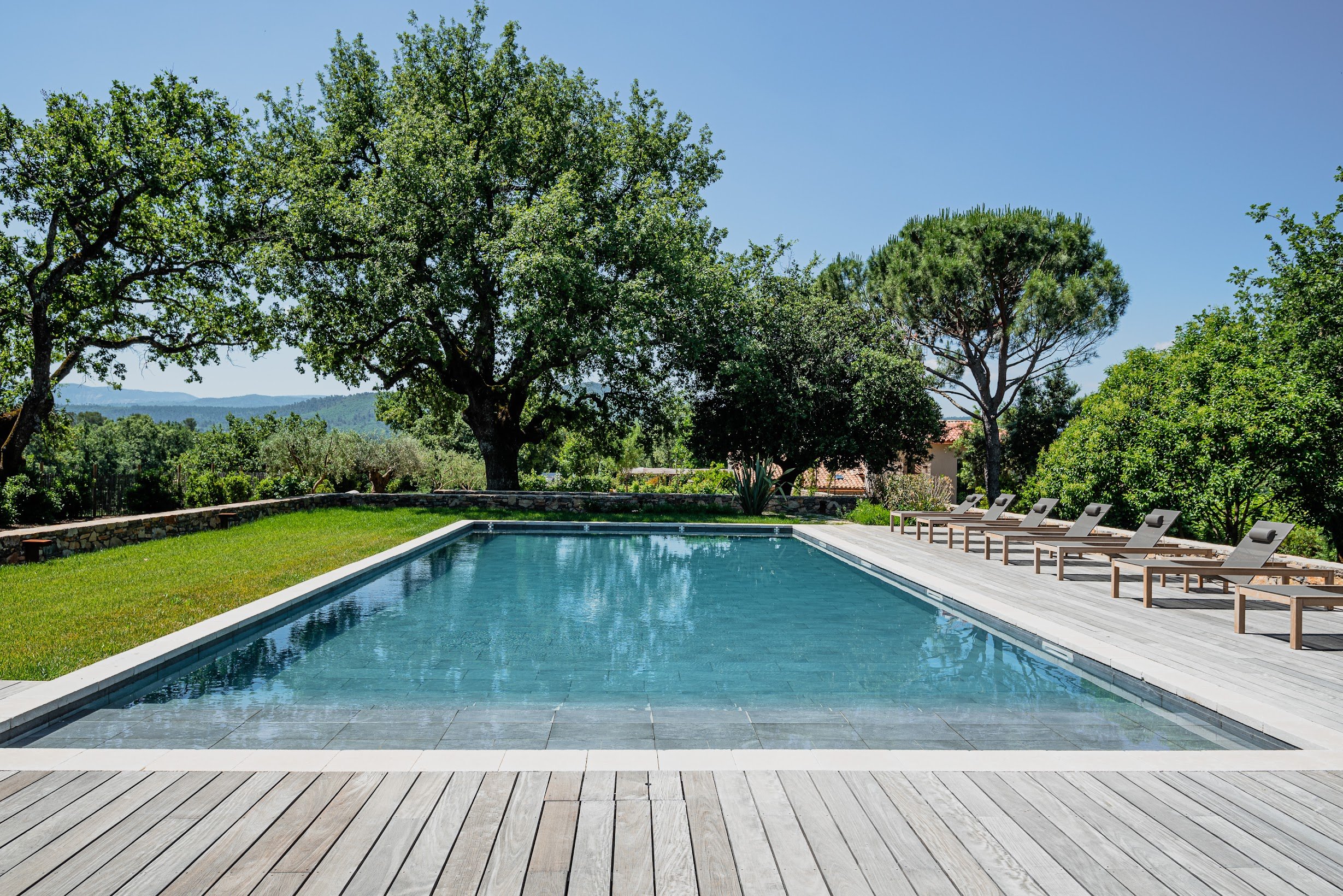 Swimming pool and tennis court on a luxury wine estate