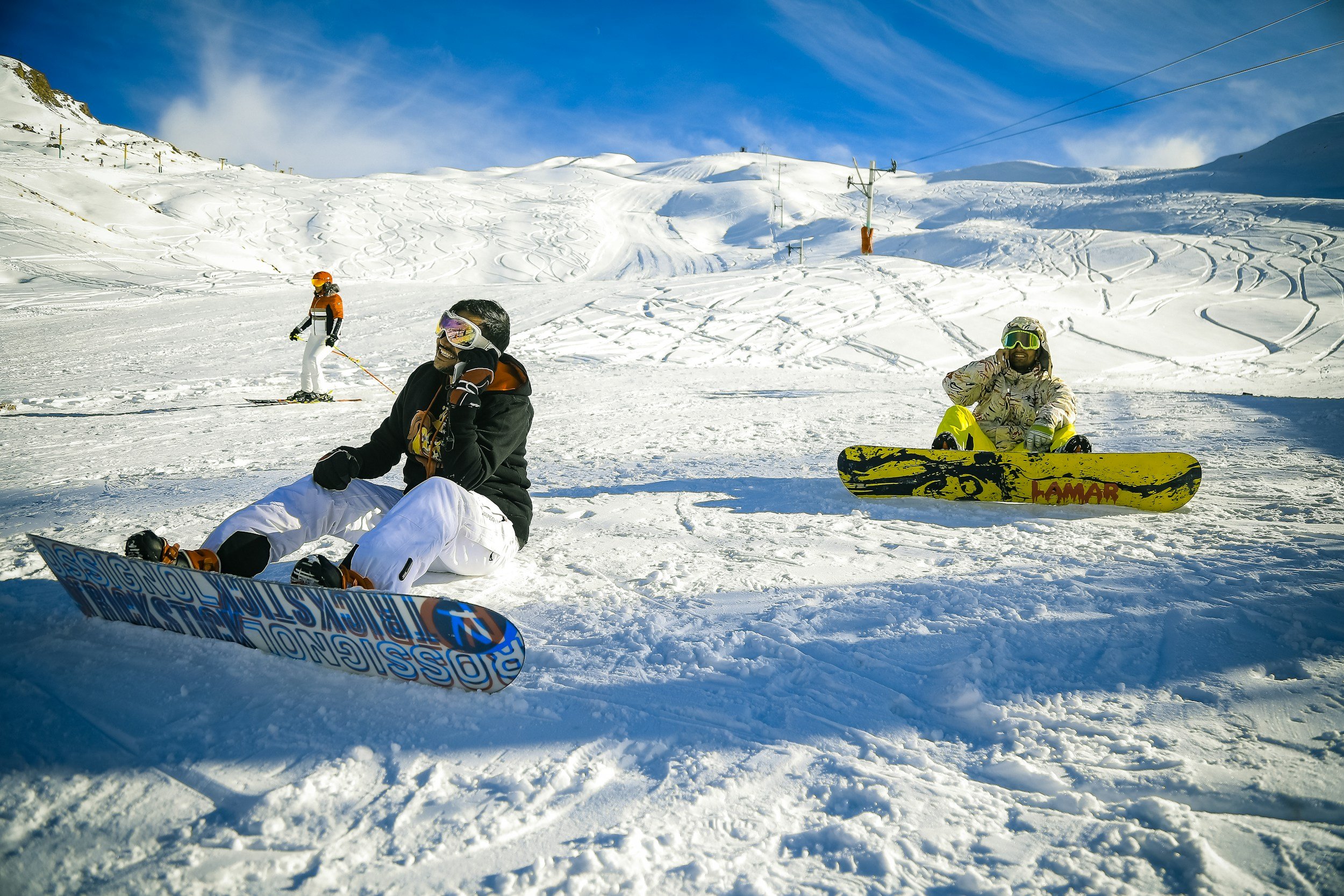 Snowboarding lessons for your employees at a company retreat in the mountains in a luxury chalet