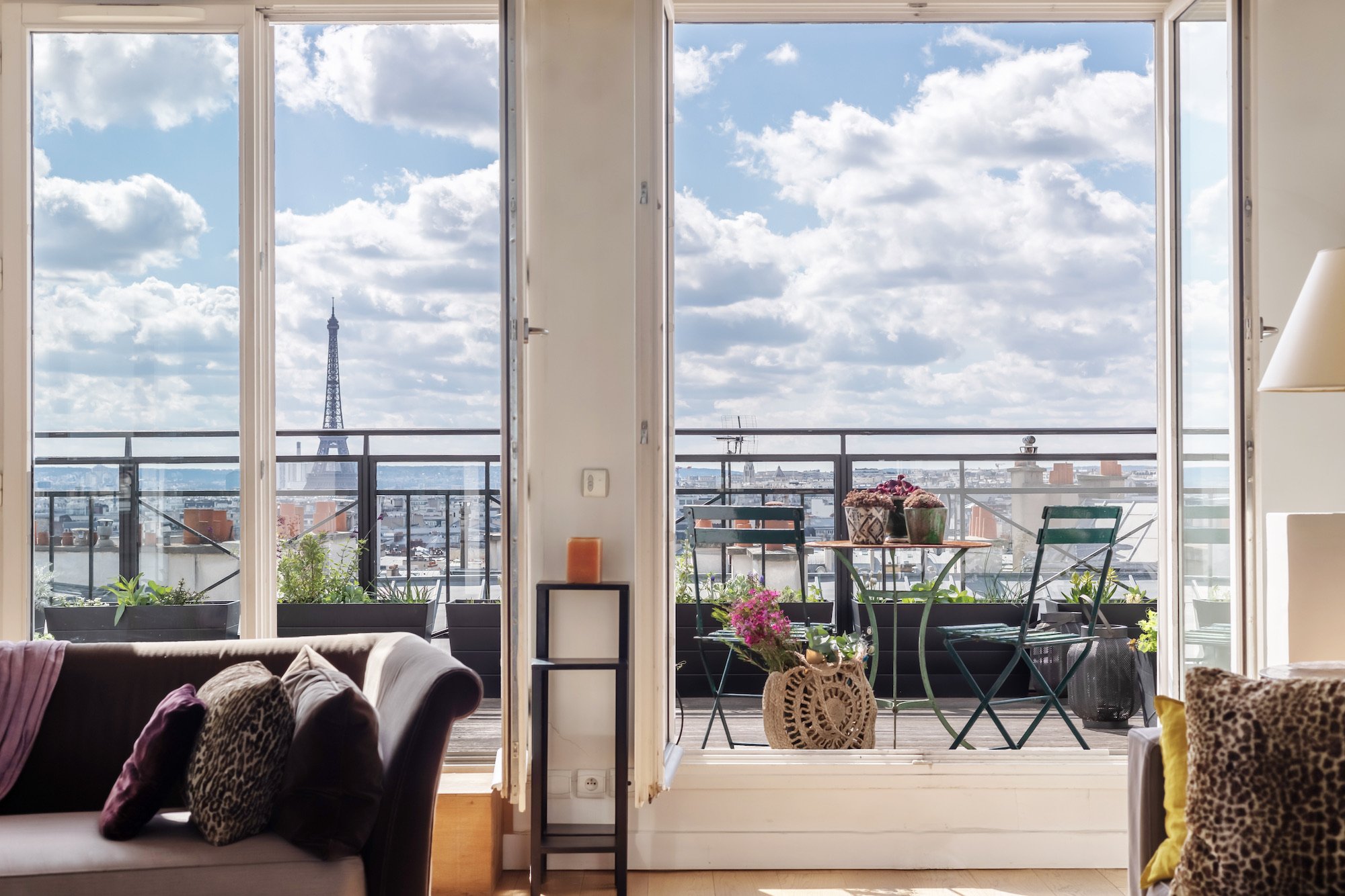 Luxury apartment in Paris with rooftop view of the Eiffel Tower and central Paris