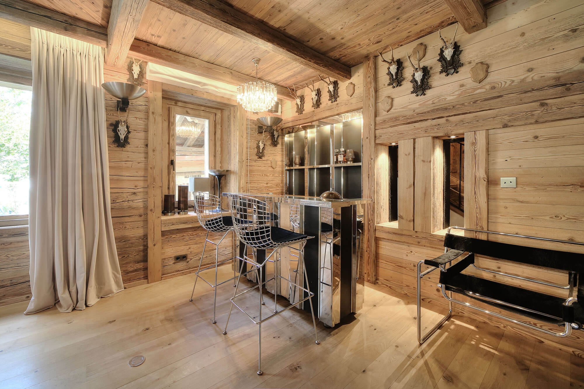 Luxury chalet in Megève ski in ski out with hotel service, swimming pool and spa overlooking Mont Blanc 