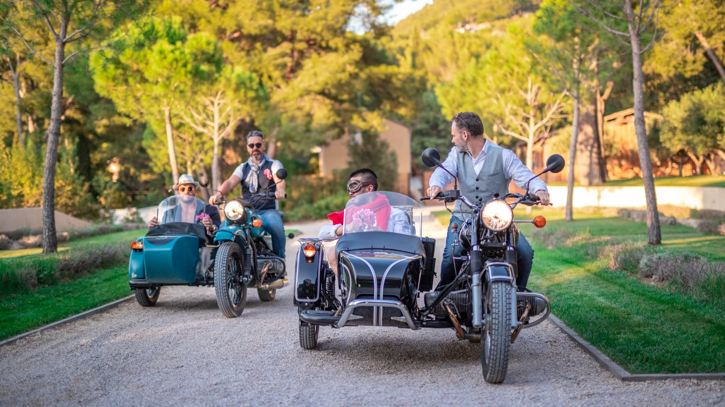 Group of guests taking part in a seminar in a vintage motorcycle sidecar