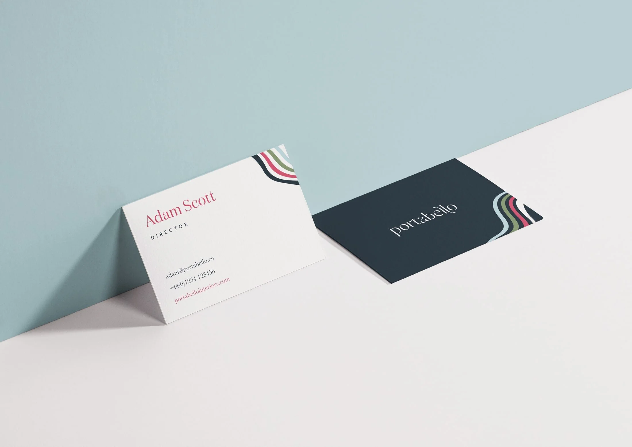 Business cards are printed on uncoated, thick 600gsm textured card for an elegant and substantial feel. The logo and signature curves are specially finished during the print process so that they present differently under the light, with spot gloss an