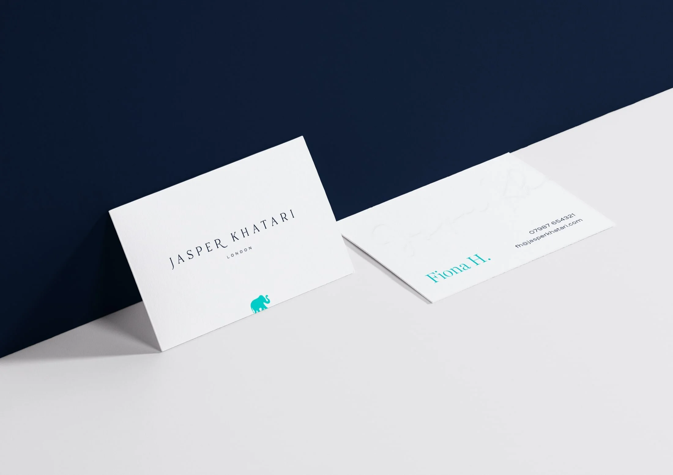 Company business cards again make use of the elephant brand mark, with subtle flashes of colour. Jasper’s signature is embossed on the back of each business card for an added personal touch.