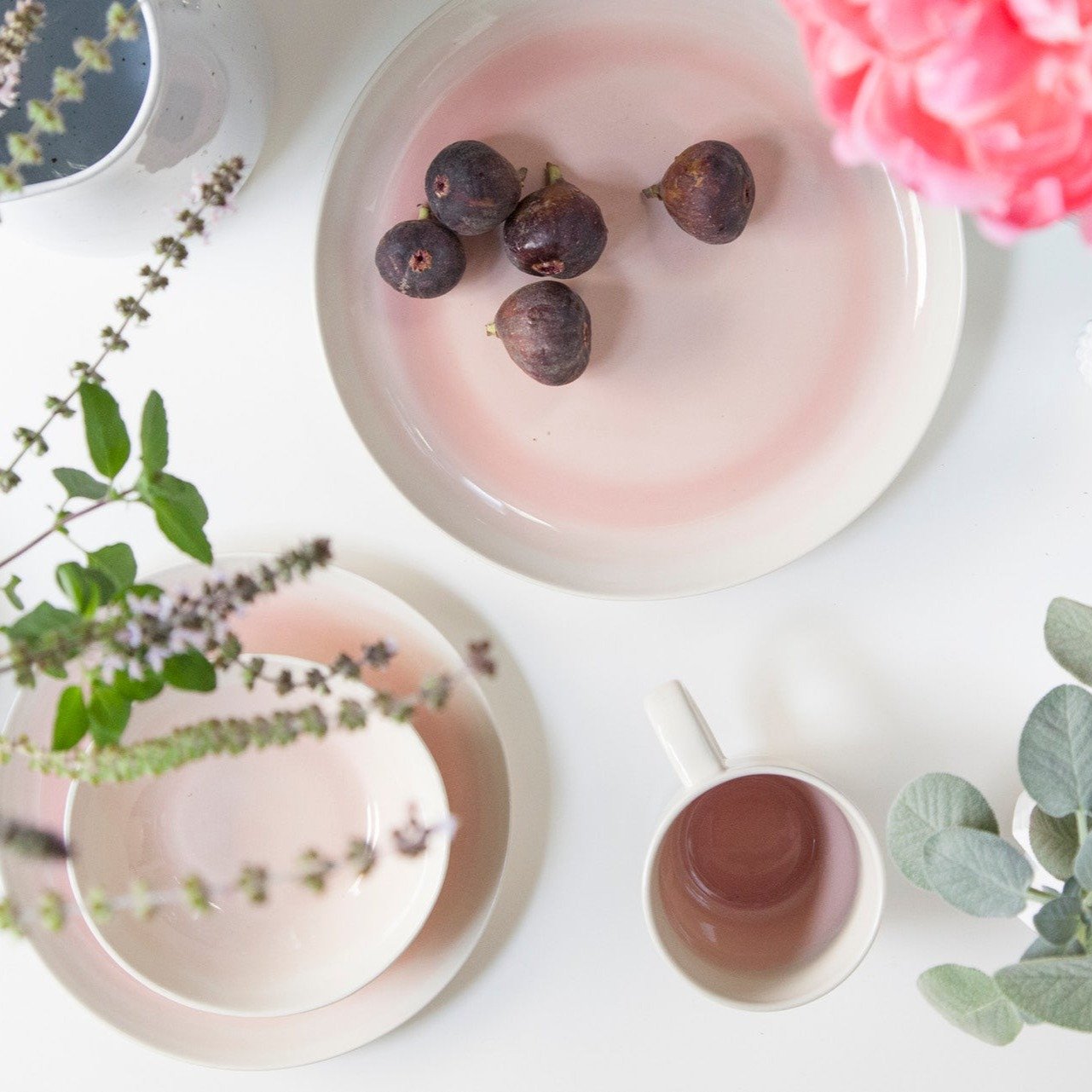 A vintage-like cream is brushed with a pale rose, creating a colorway that evokes the faintest beginnings of a setting sun. Everything you need for a weekend brunch, afternoon rendezvous and every moment in between. Tap our link in bio to shop these 