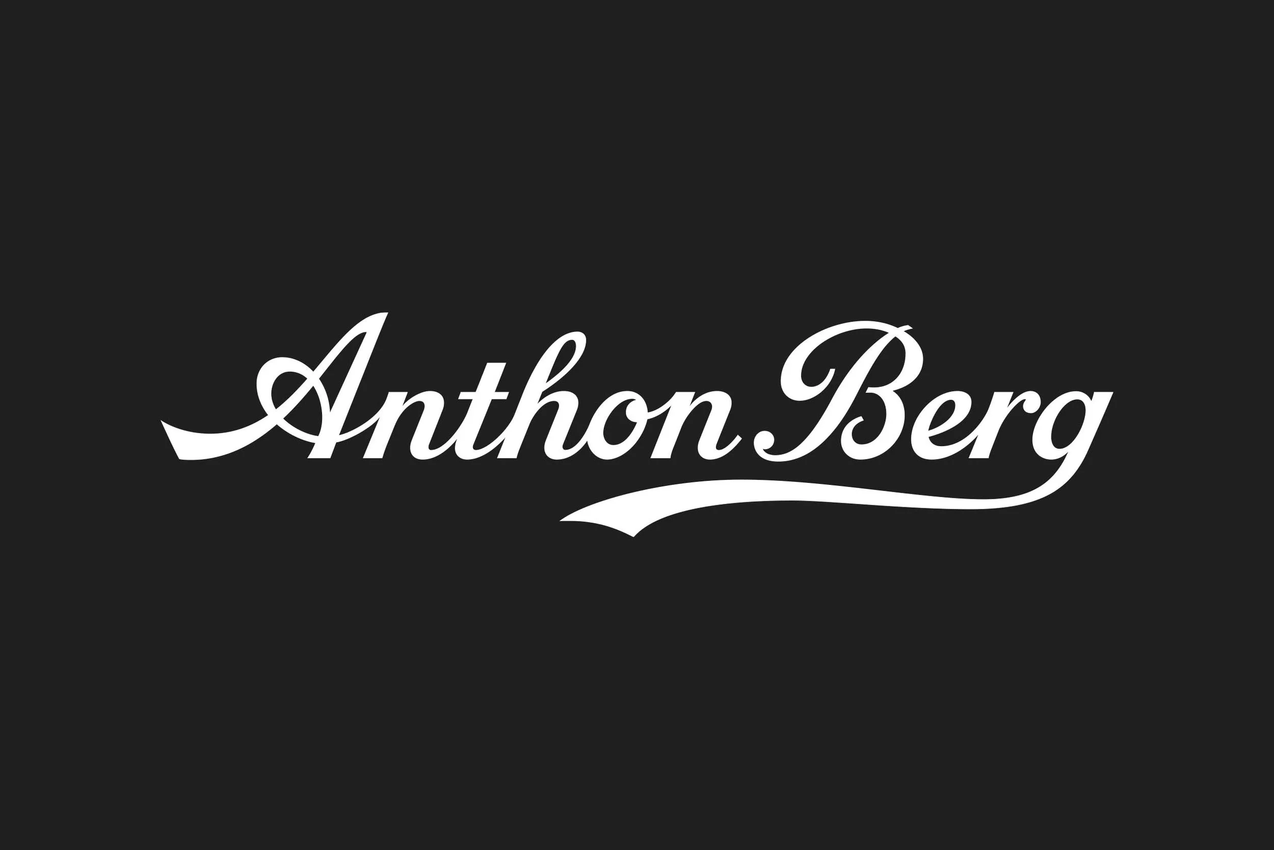 White cursive text reading 'Anthon Berg' on a black background.
