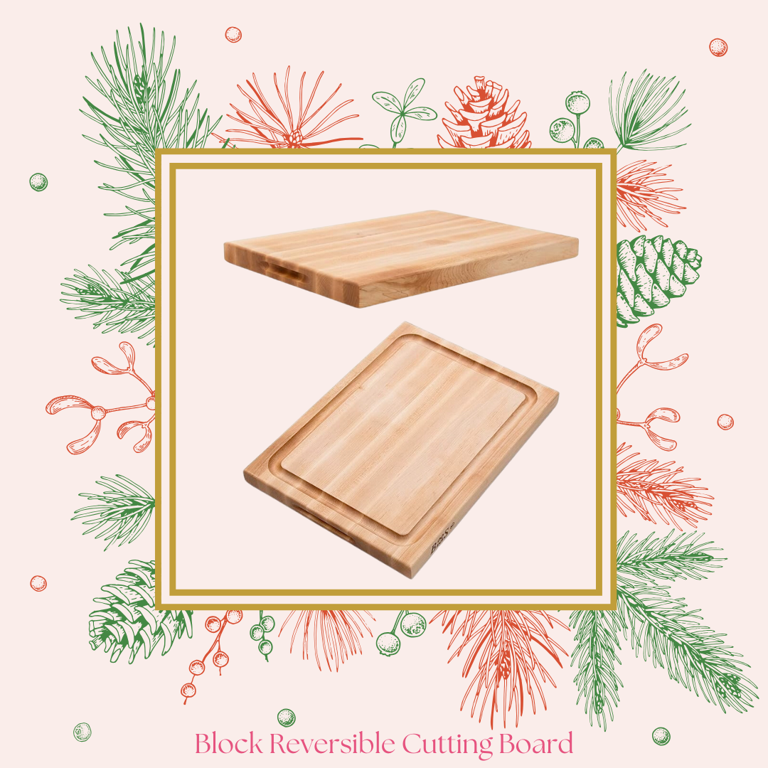 A wooden reversible cutting board with one smooth side and one grooved side, set against a festive background with pine branches and berries, and the text ‘Block Reversible Cutting Board’ at the bottom.