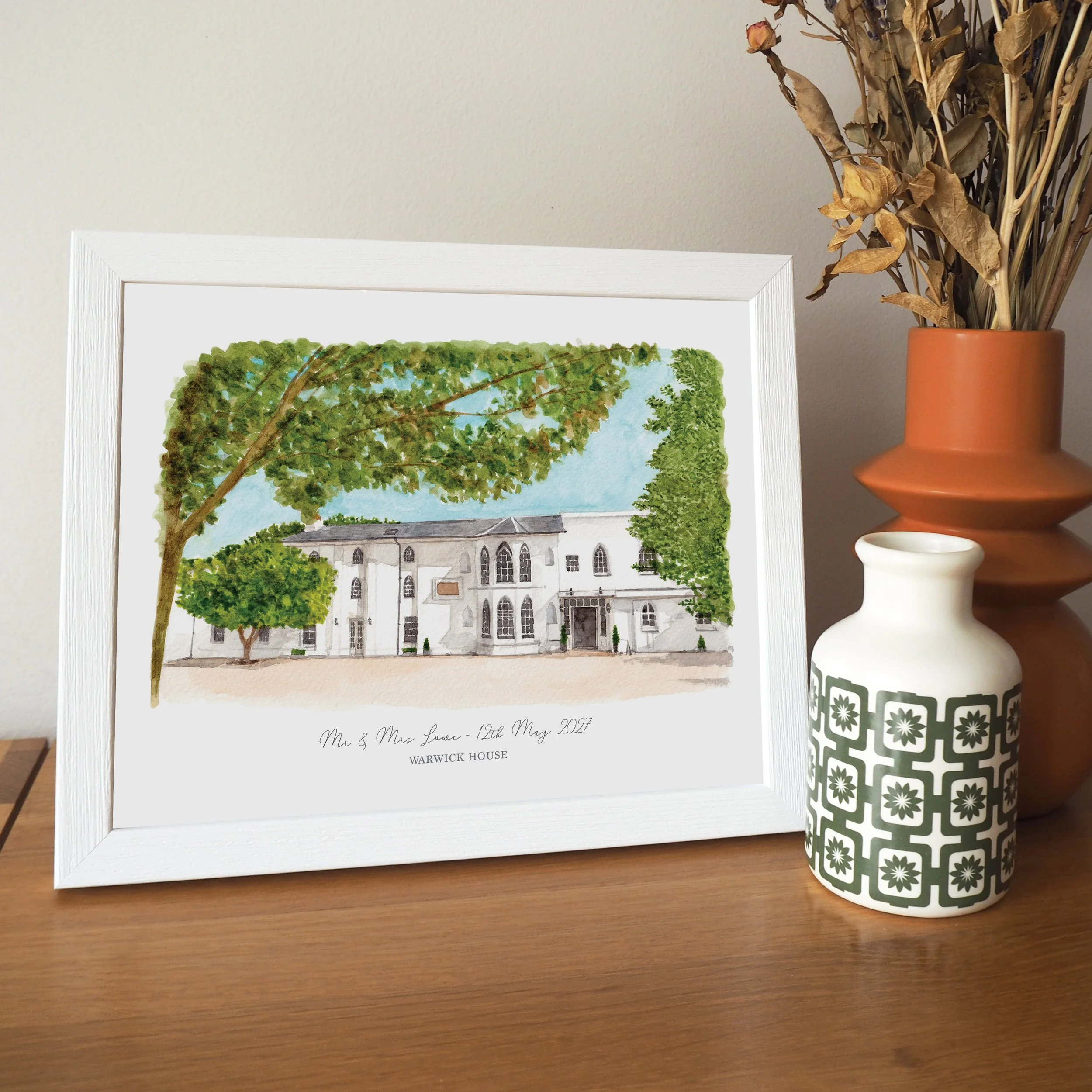 a framed personalised print of a watercolour painting of wedding venue warwick house