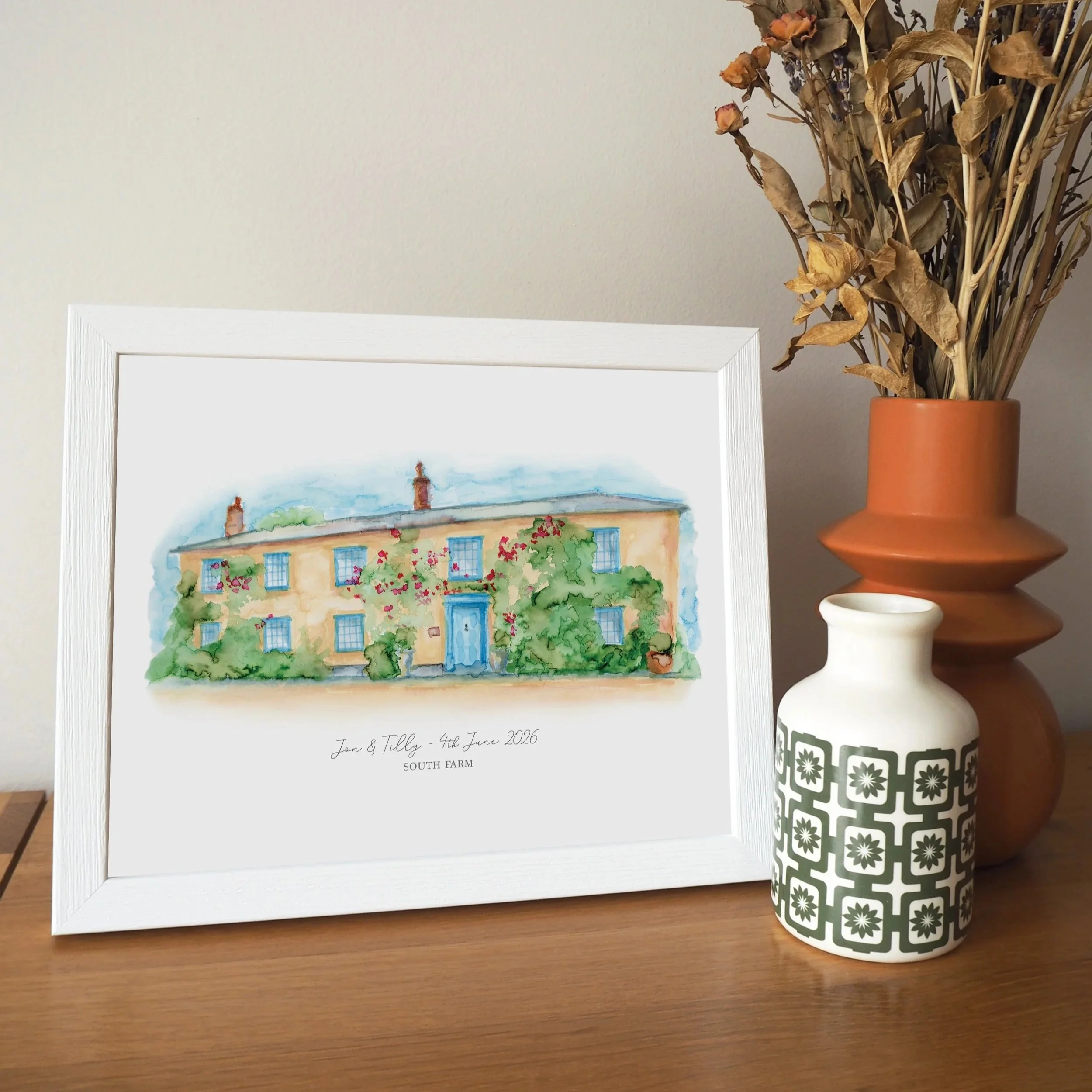 A framed personalised print of a watercolour painting of wedding venue South Farm