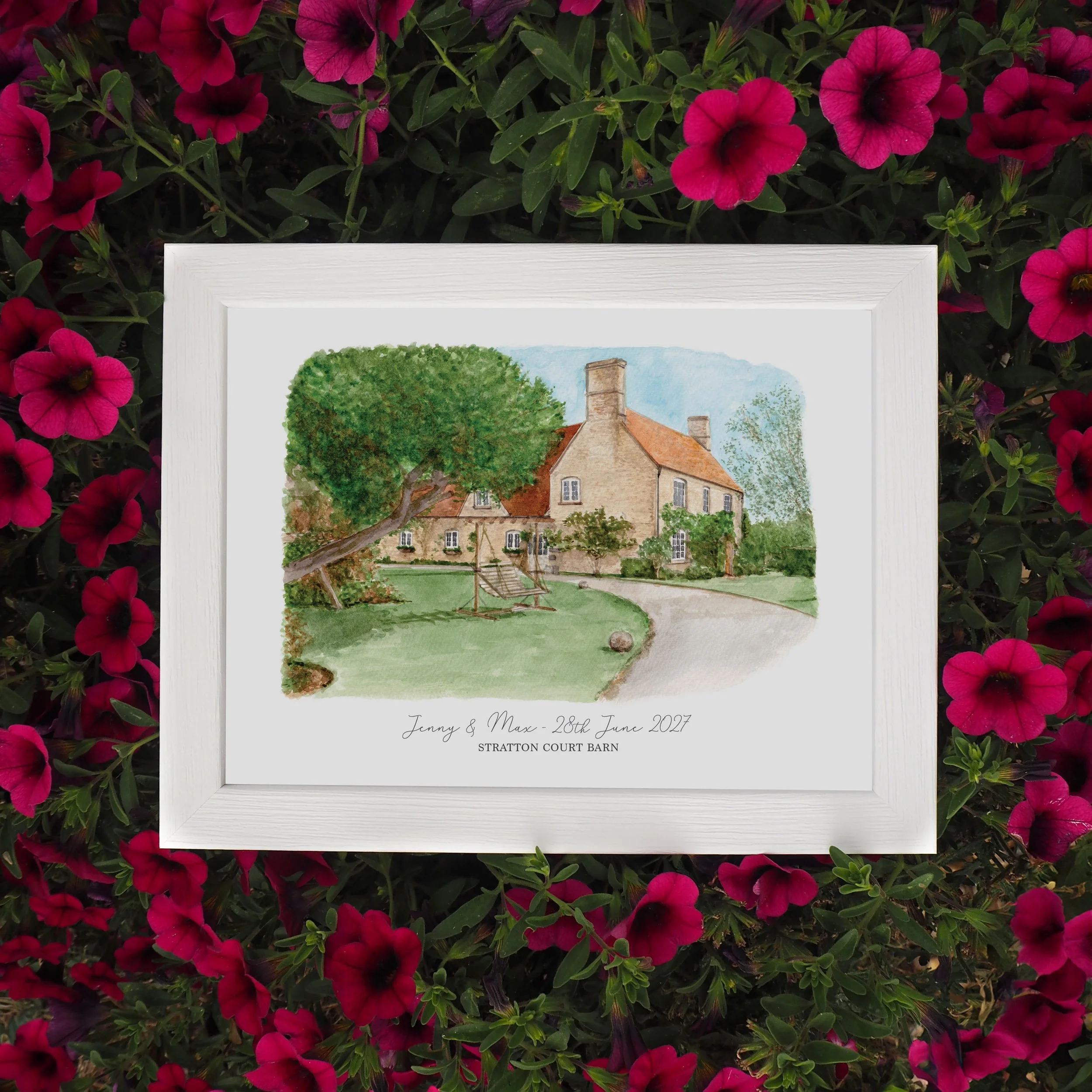 a framed personalised print of a watercolour painting of wedding venue Stratton Court Barn