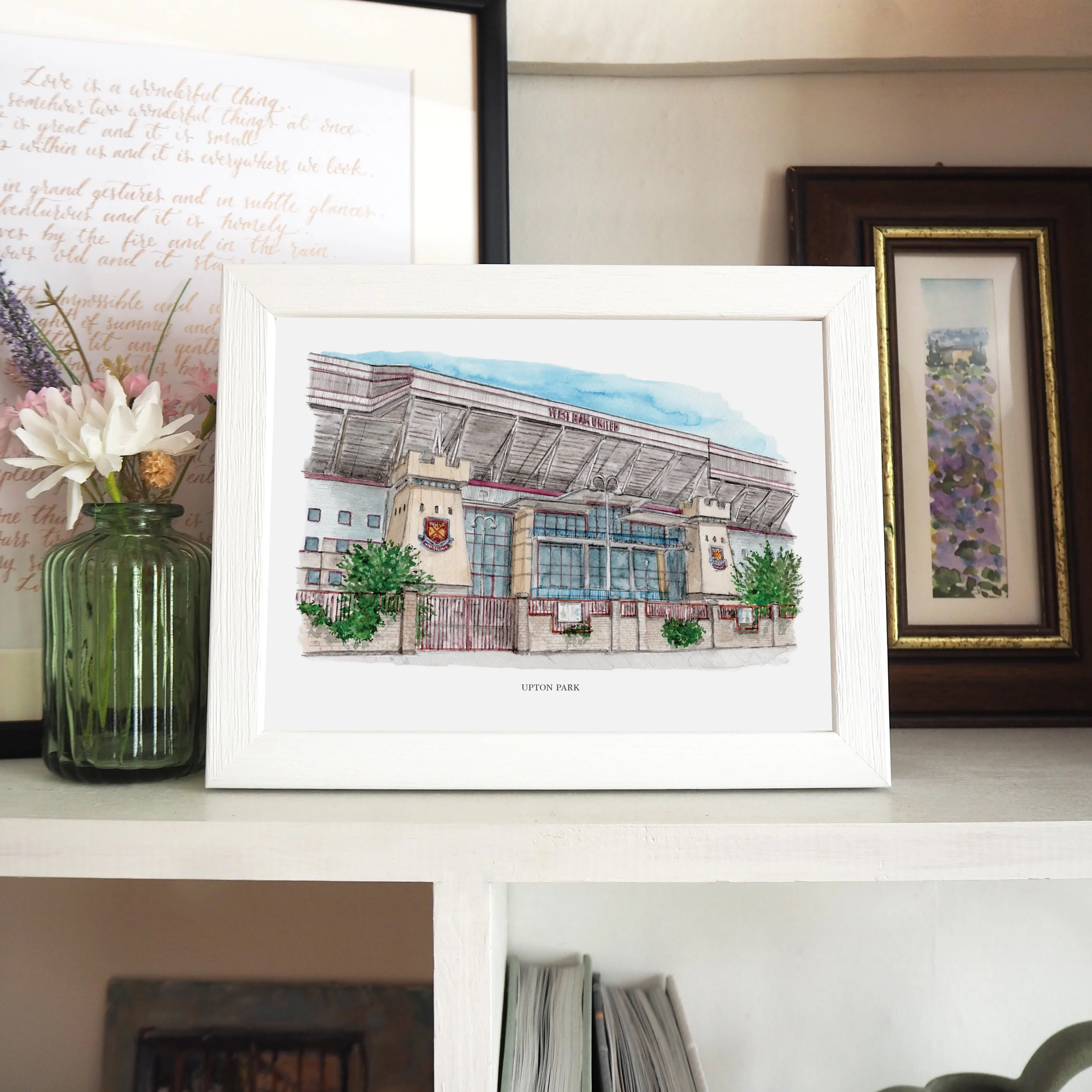 A framed personalised print of a watercolour painting of Upton Park stadium (West Ham football ground)