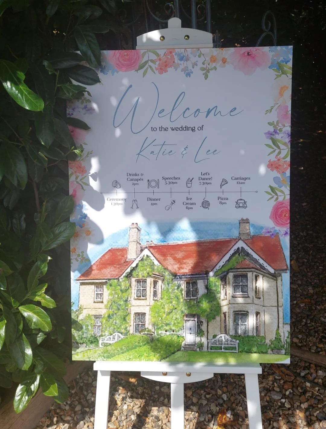 wedding welcome board featuring watercolour illustration of lodge farm and pink florals