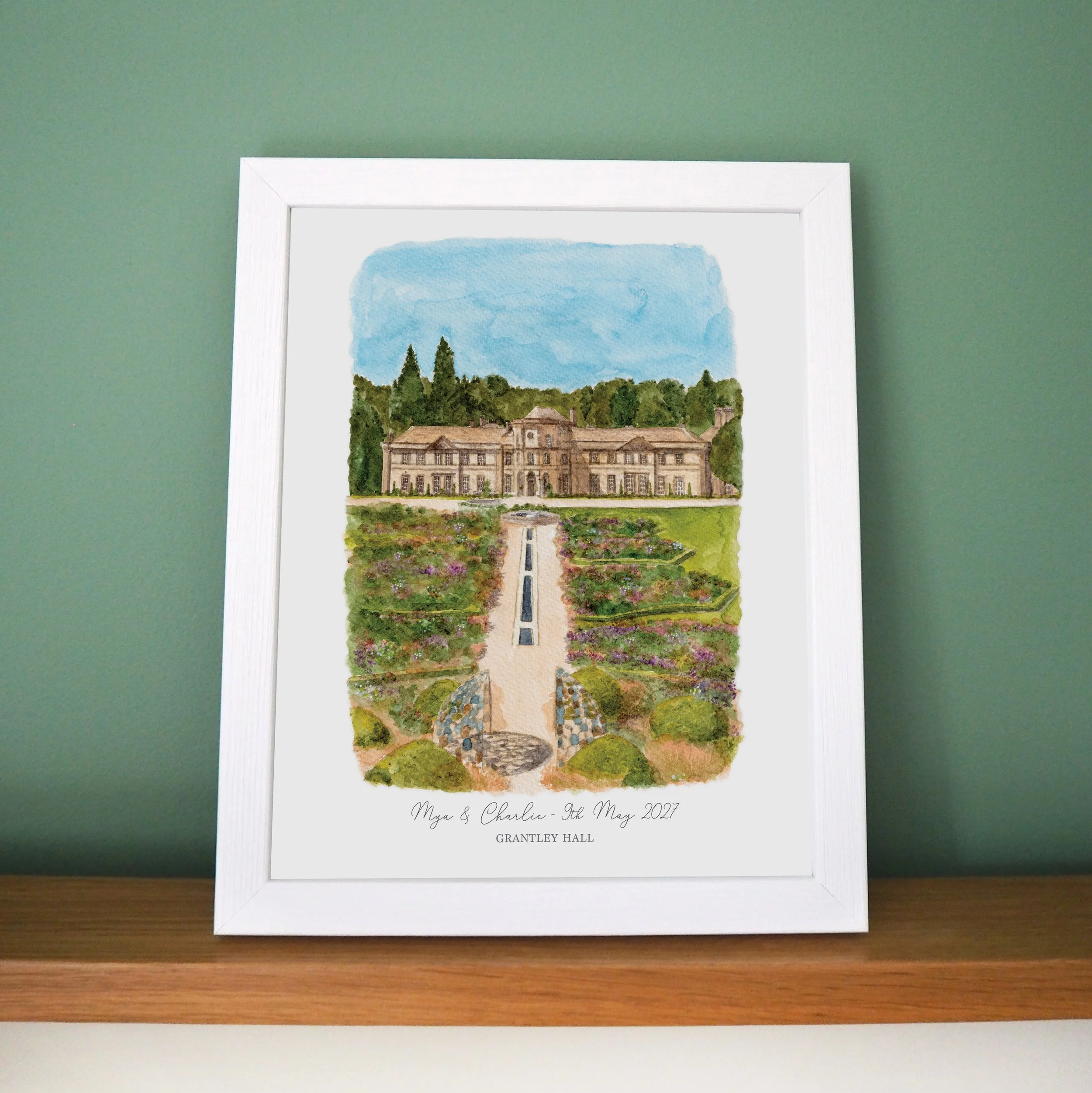 a framed personalised print of a watercolour illustration of wedding venue Grantley Hall in Yorkshire