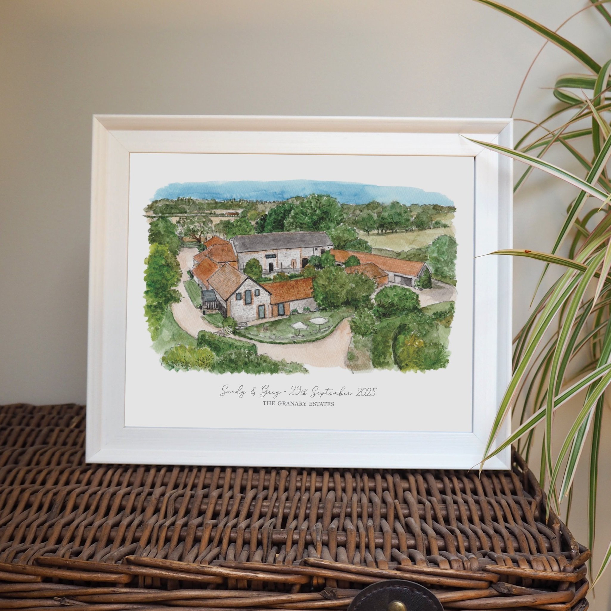 A framed personalised print of a watercolour painting of wedding venue The Granary Estates